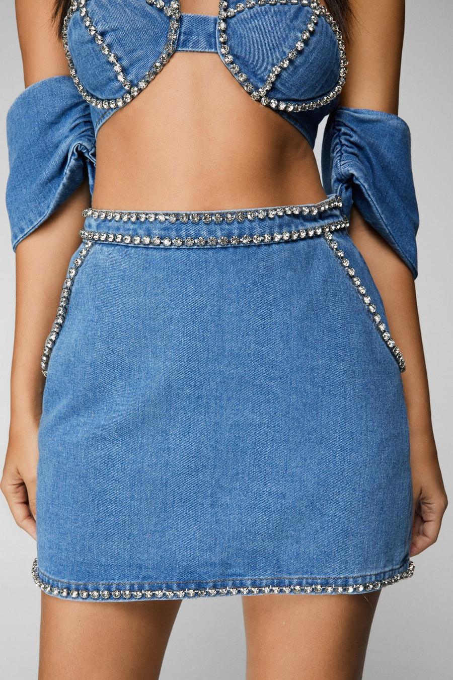Mini jupe en jean à bordure strassée