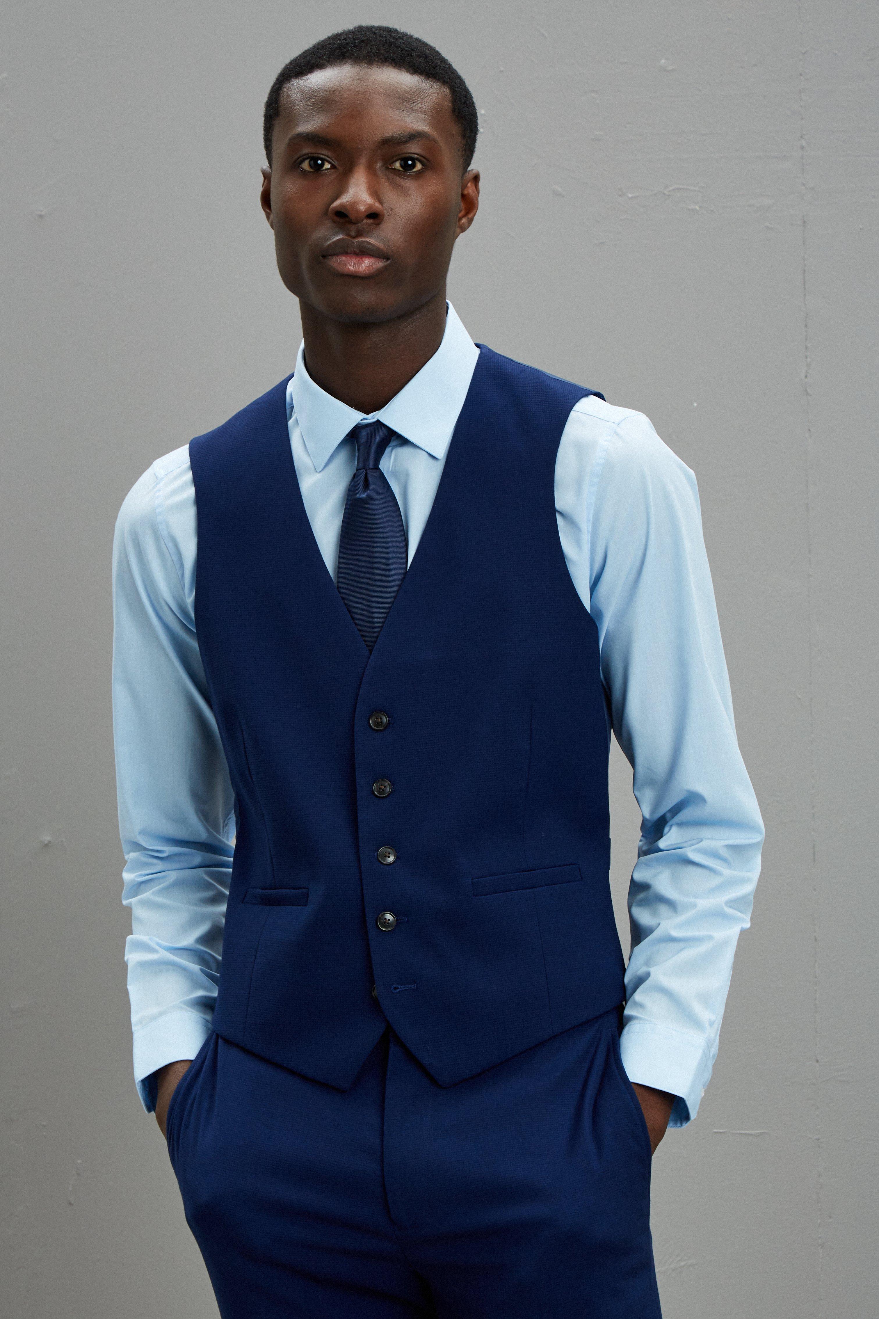 black suit navy waistcoat