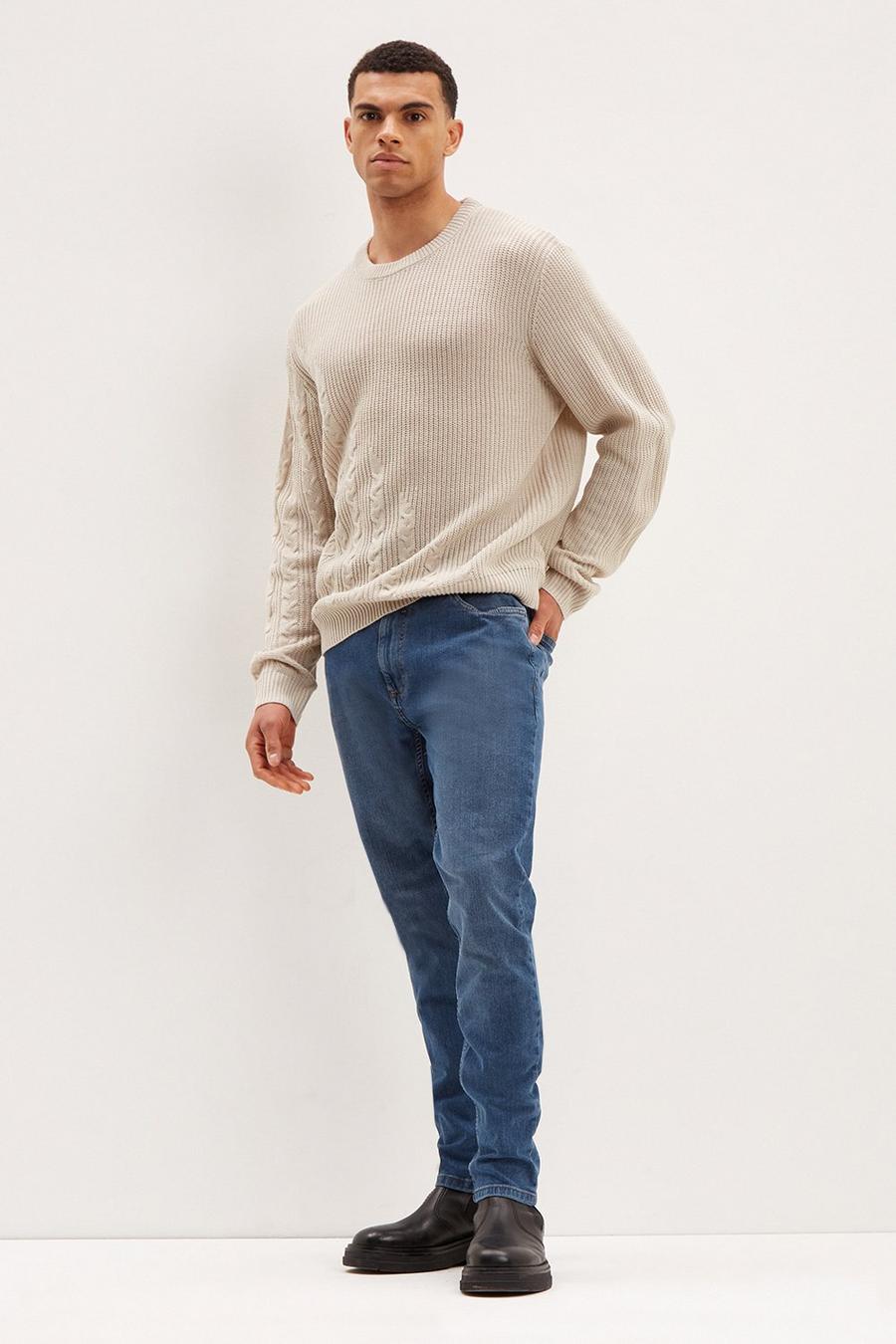 Tapered Mid Wash Jeans