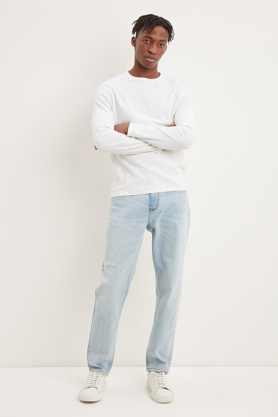 Tapered Light Blue Soft Rip And Repair Jeans