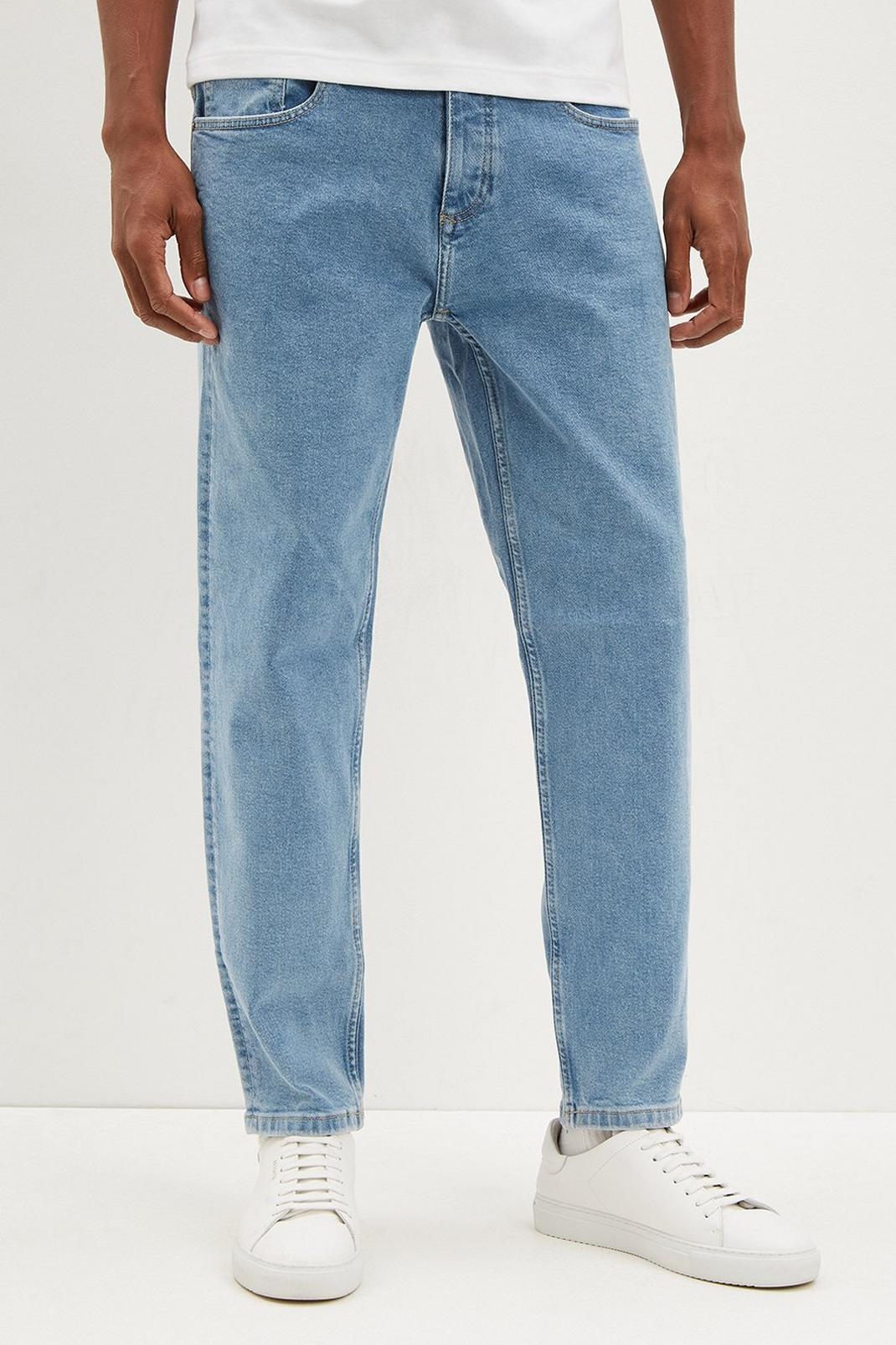Tapered Mid Blue Wash Jeans image number 1