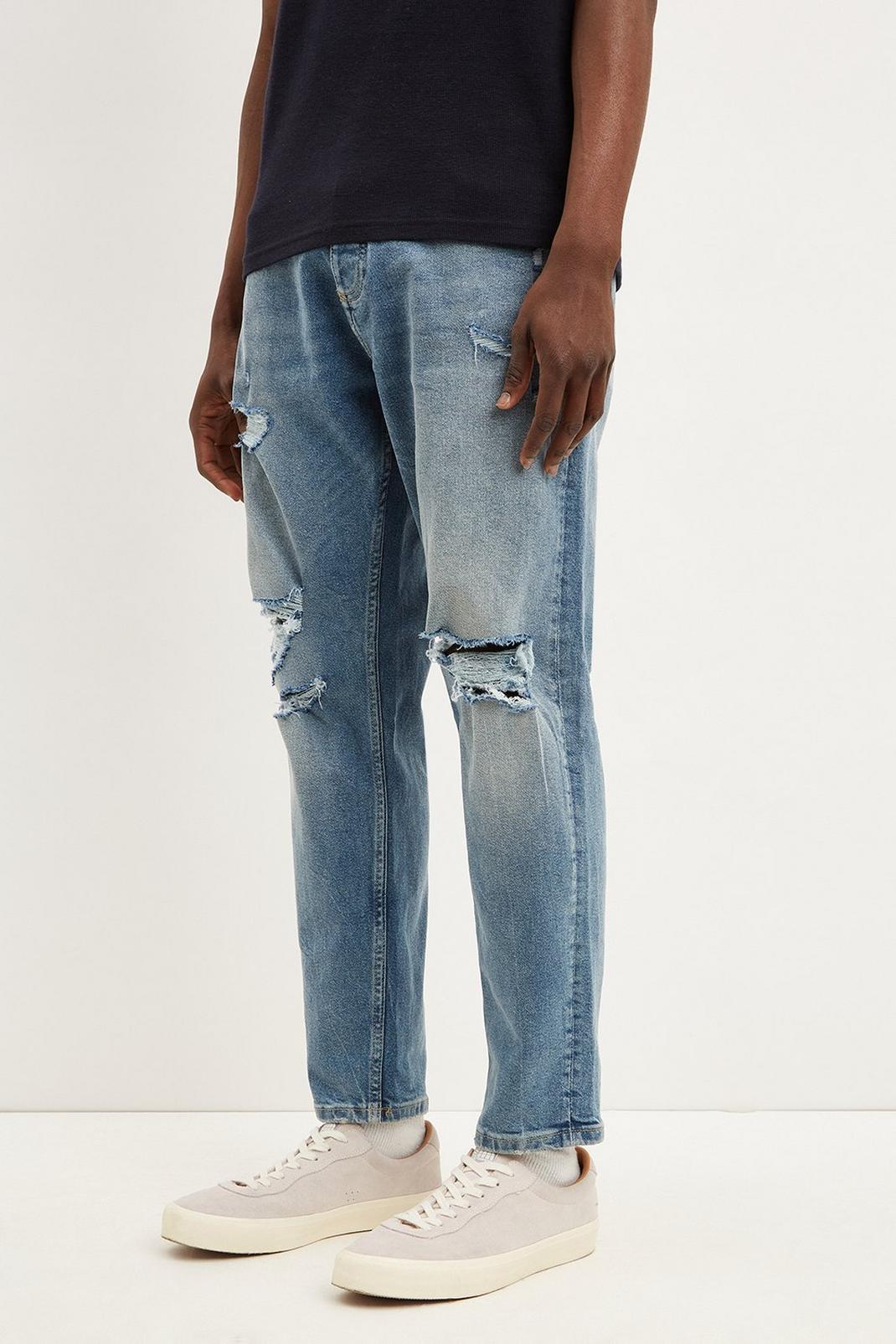 Mid blue Tapered Washed Blue Rip Jeans image number 1