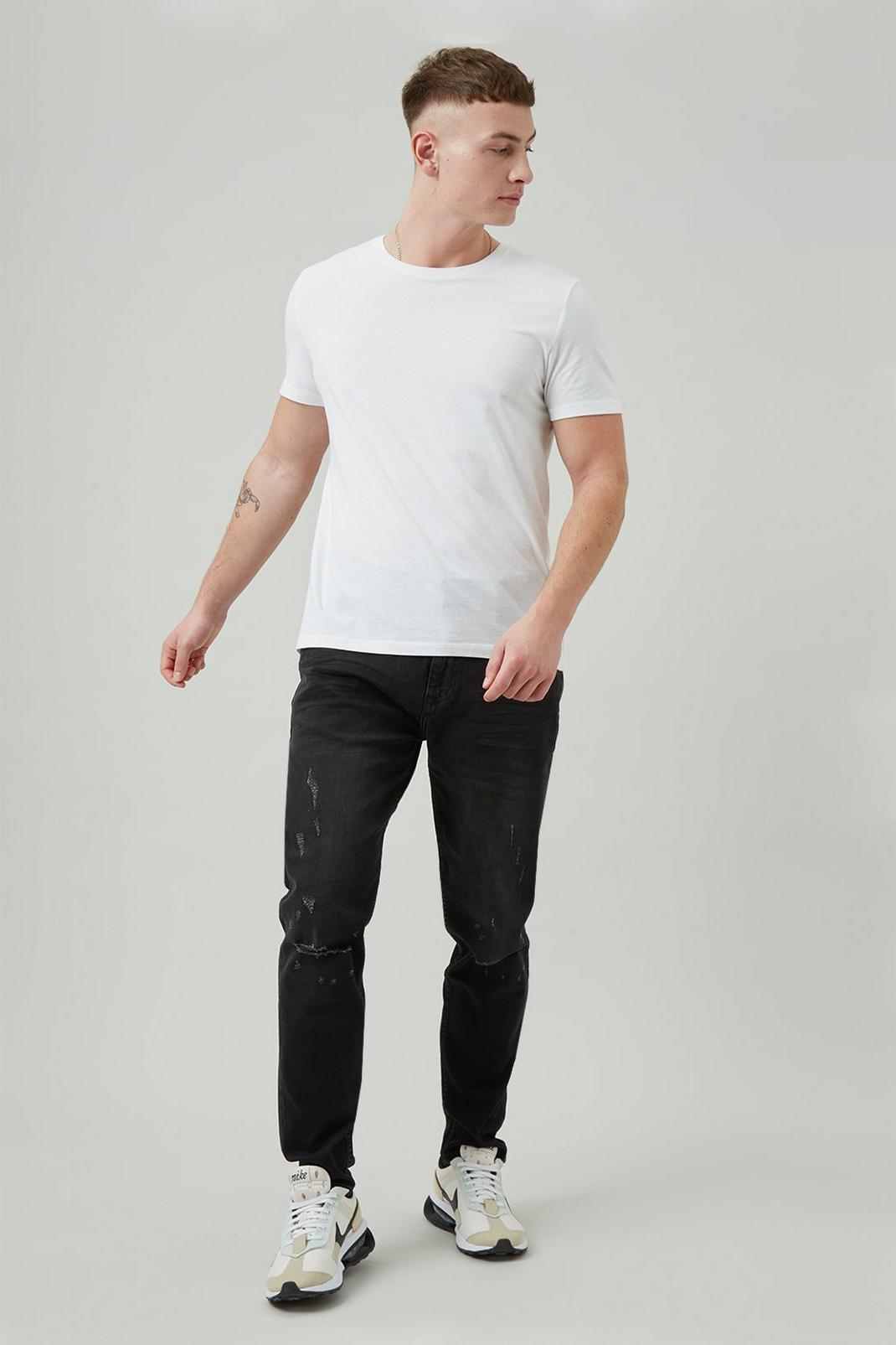 Tapered Washed Black Thigh Rip Jeans image number 1