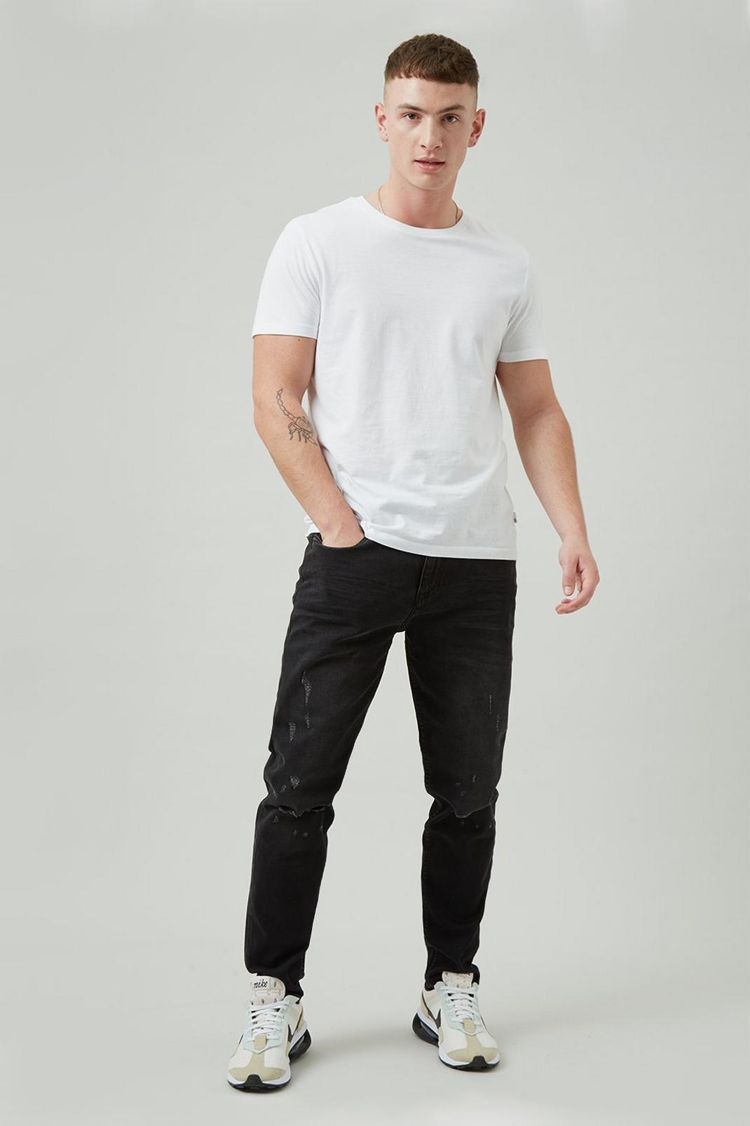 105 Tapered Washed Black Thigh Rip Jeans image number 2