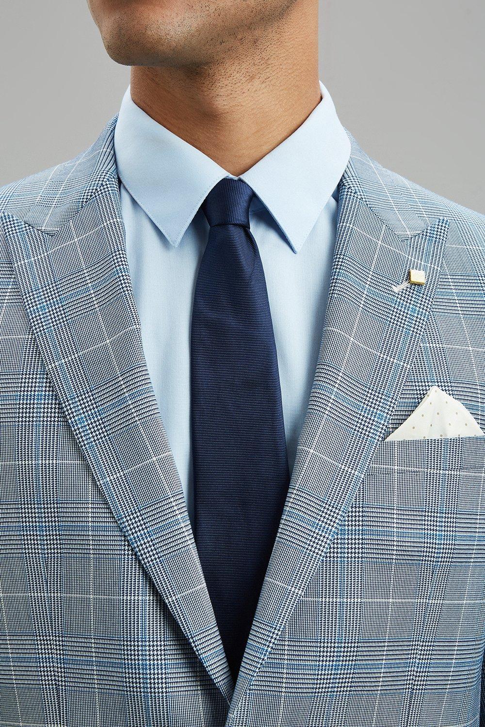 light blue chequered suit