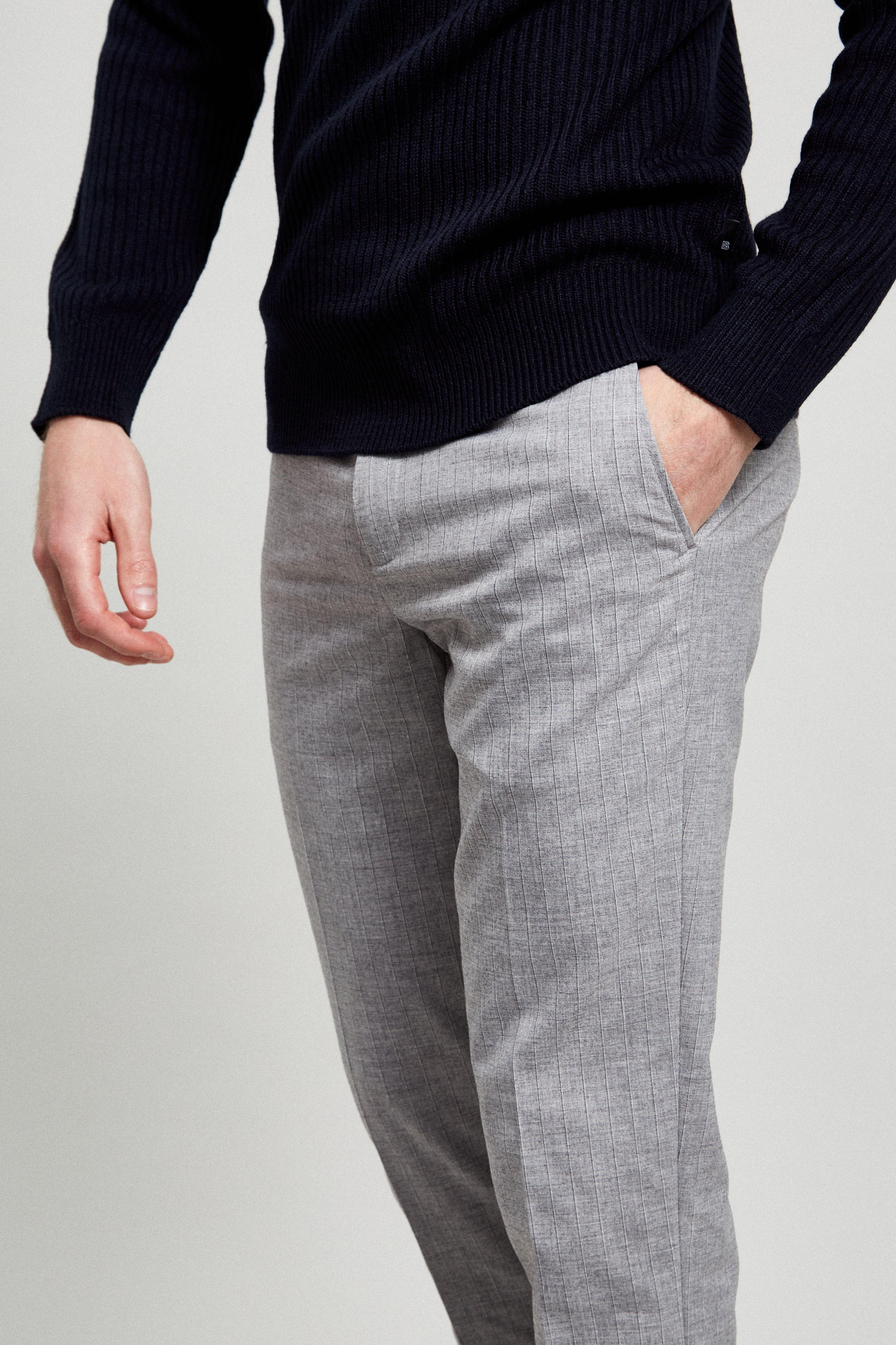 grey pants with black stripe