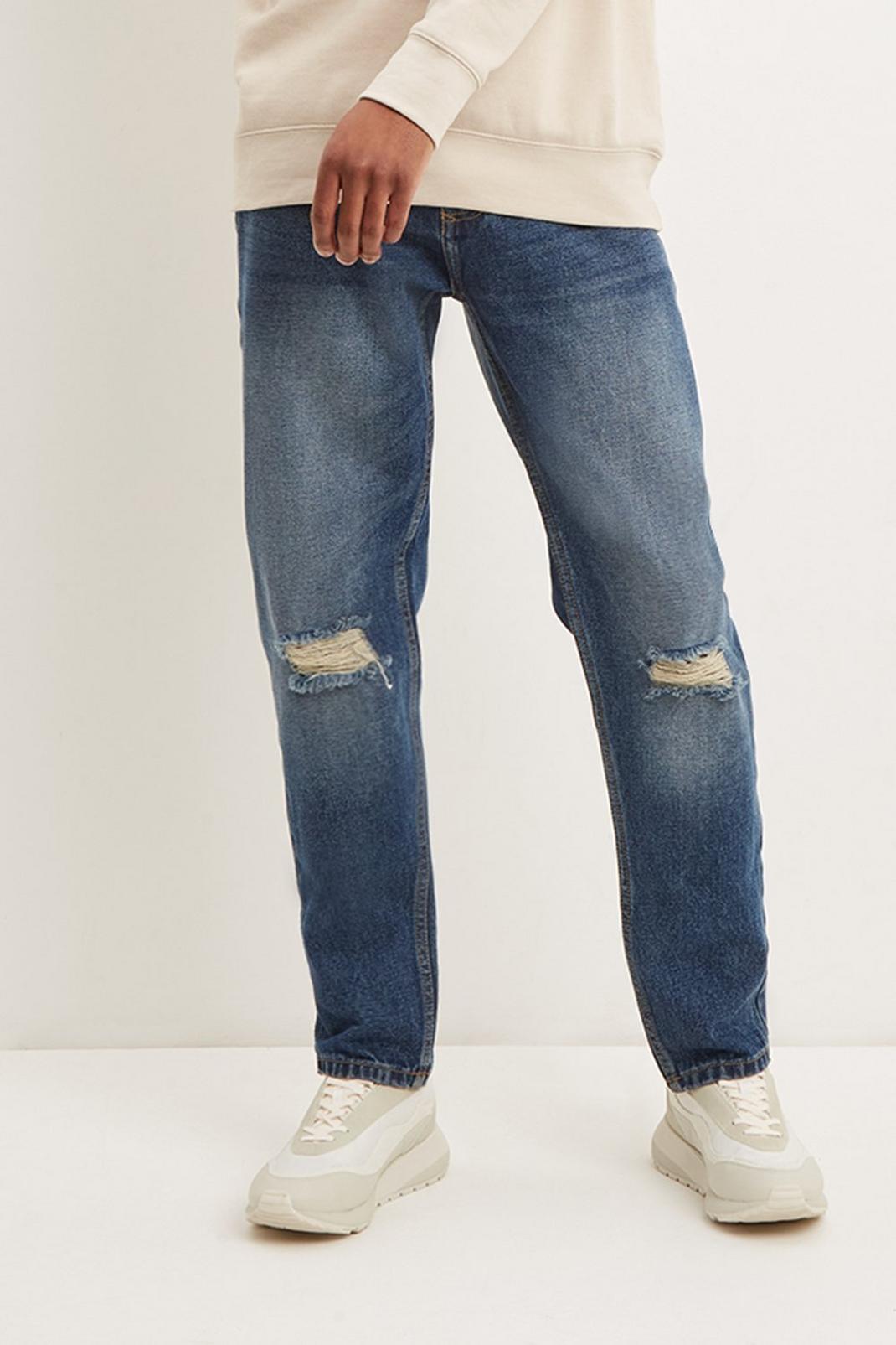 Tapered Mid Blue Rip Jeans image number 1