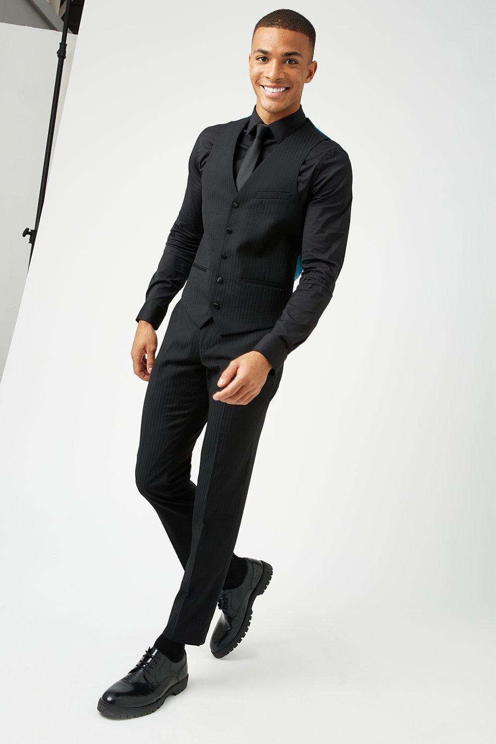 black tux with black vest