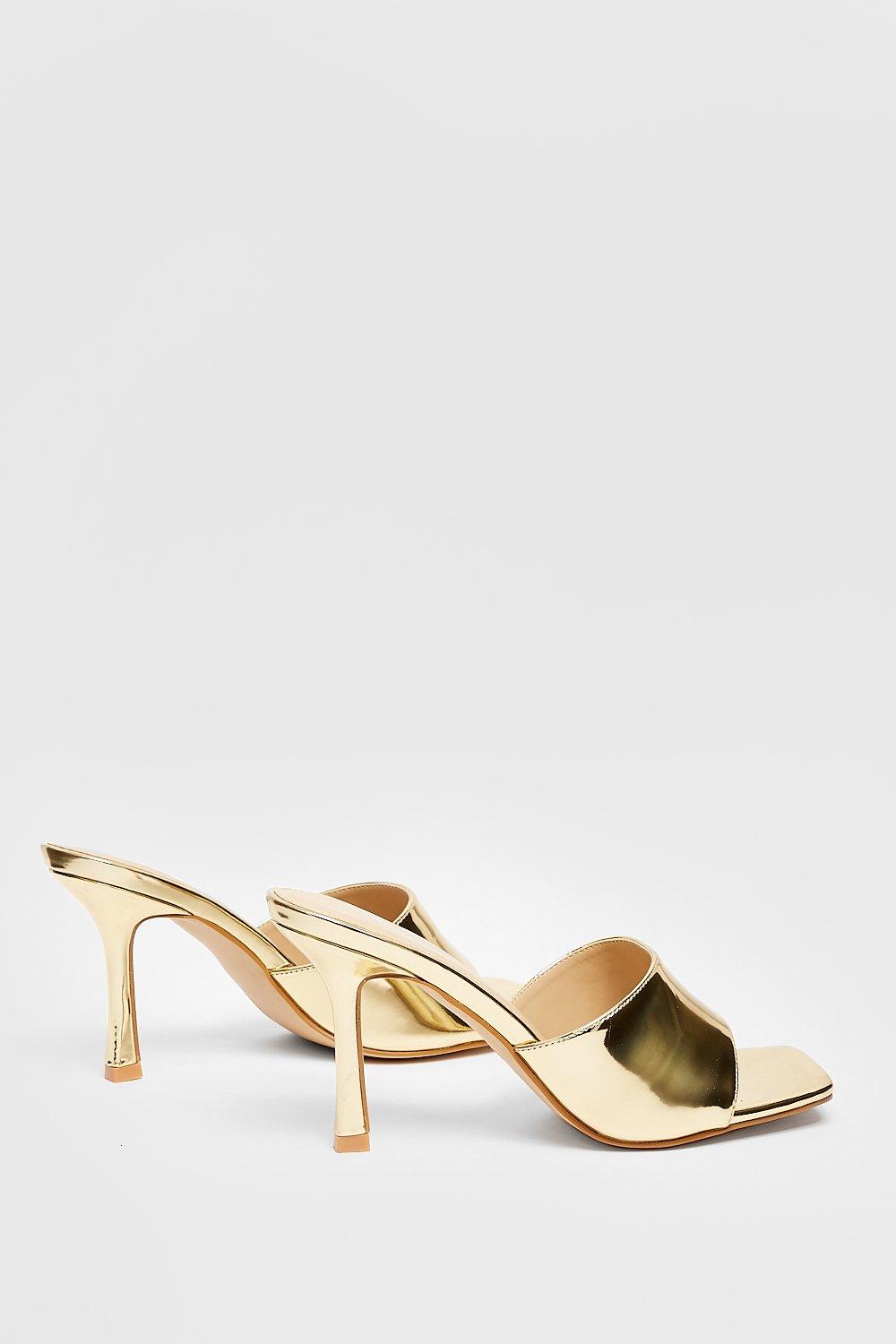 Metallic heeled outlet mules