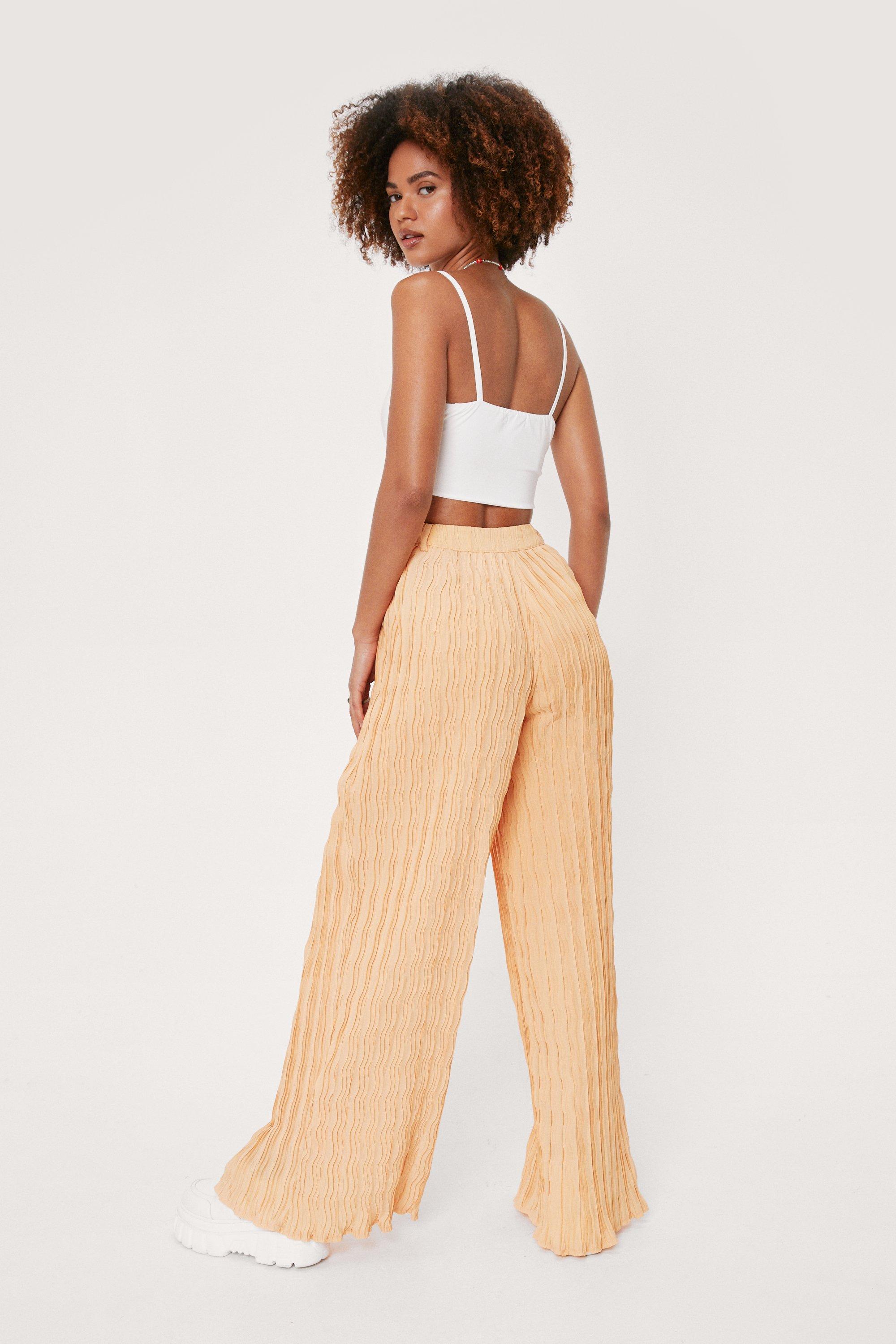 Plisse wide outlet leg trousers