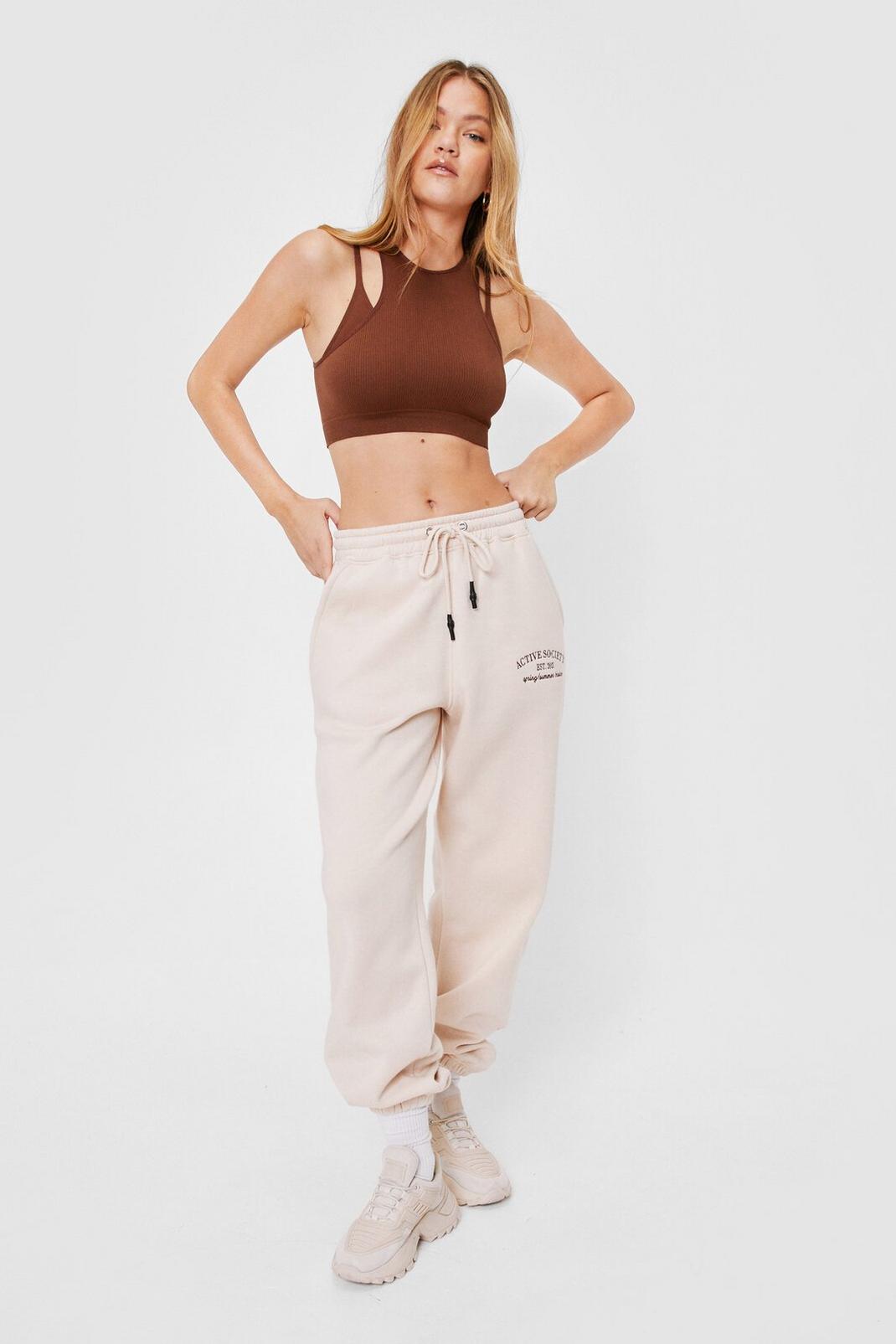 Sand Active Society Oversized Embroidered Graphic Joggers image number 1