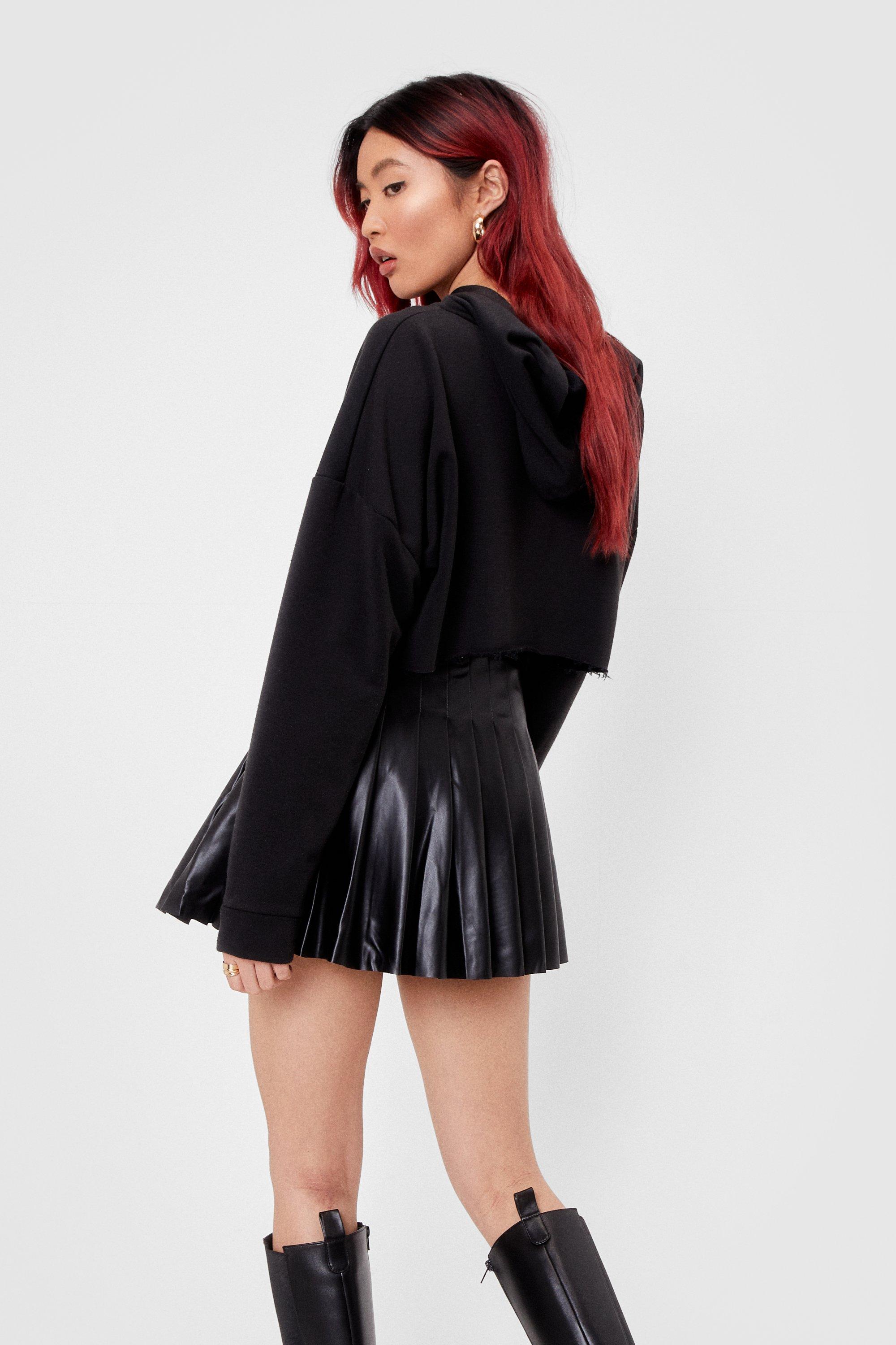 Black faux leather stud outlet detail belted mini skirt