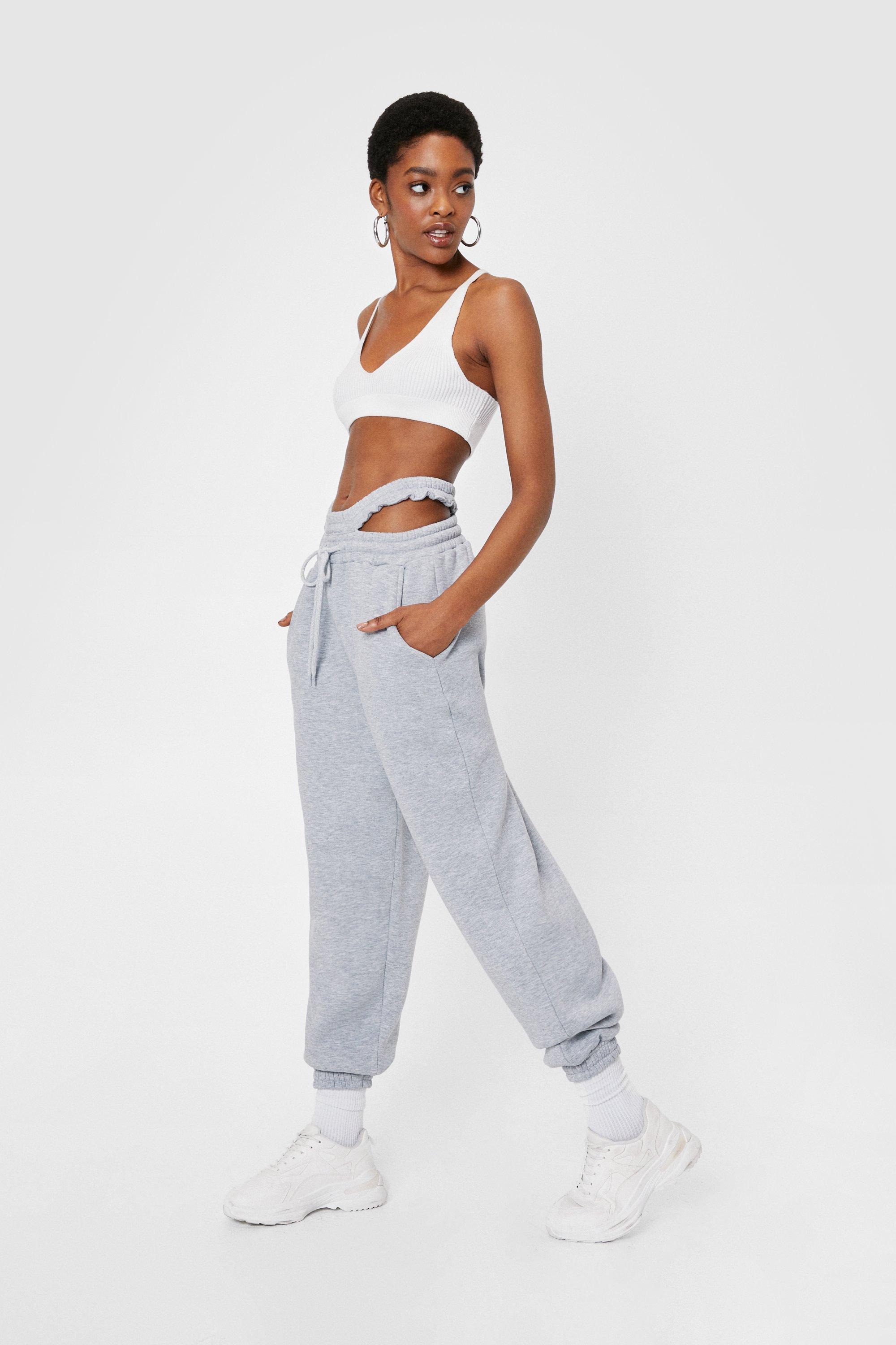 https://media.nastygal.com/i/nastygal/agg03979_grey_xl_2/cut-out-waist-oversized-joggers