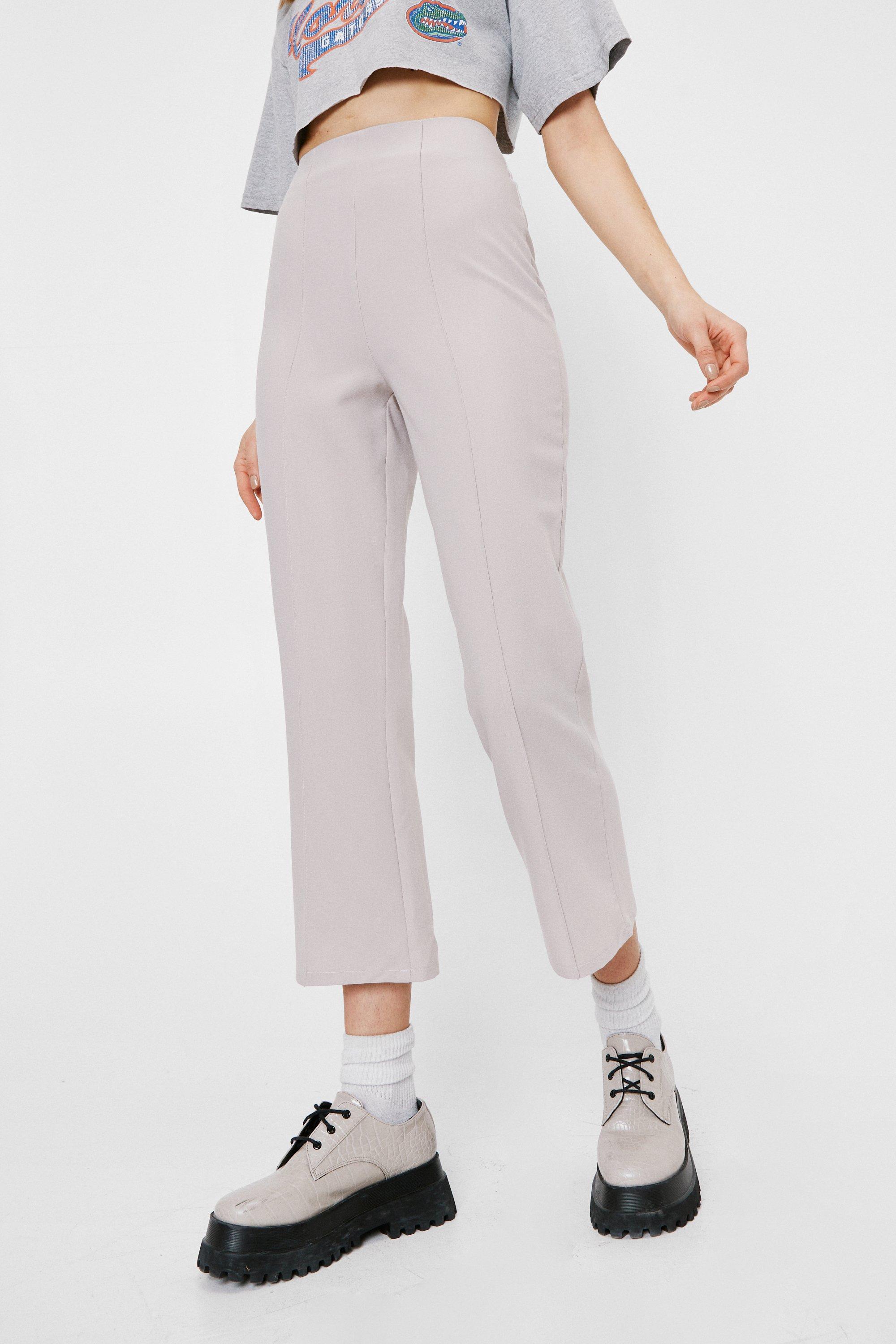 Pantalon flare court pinces et taille haute