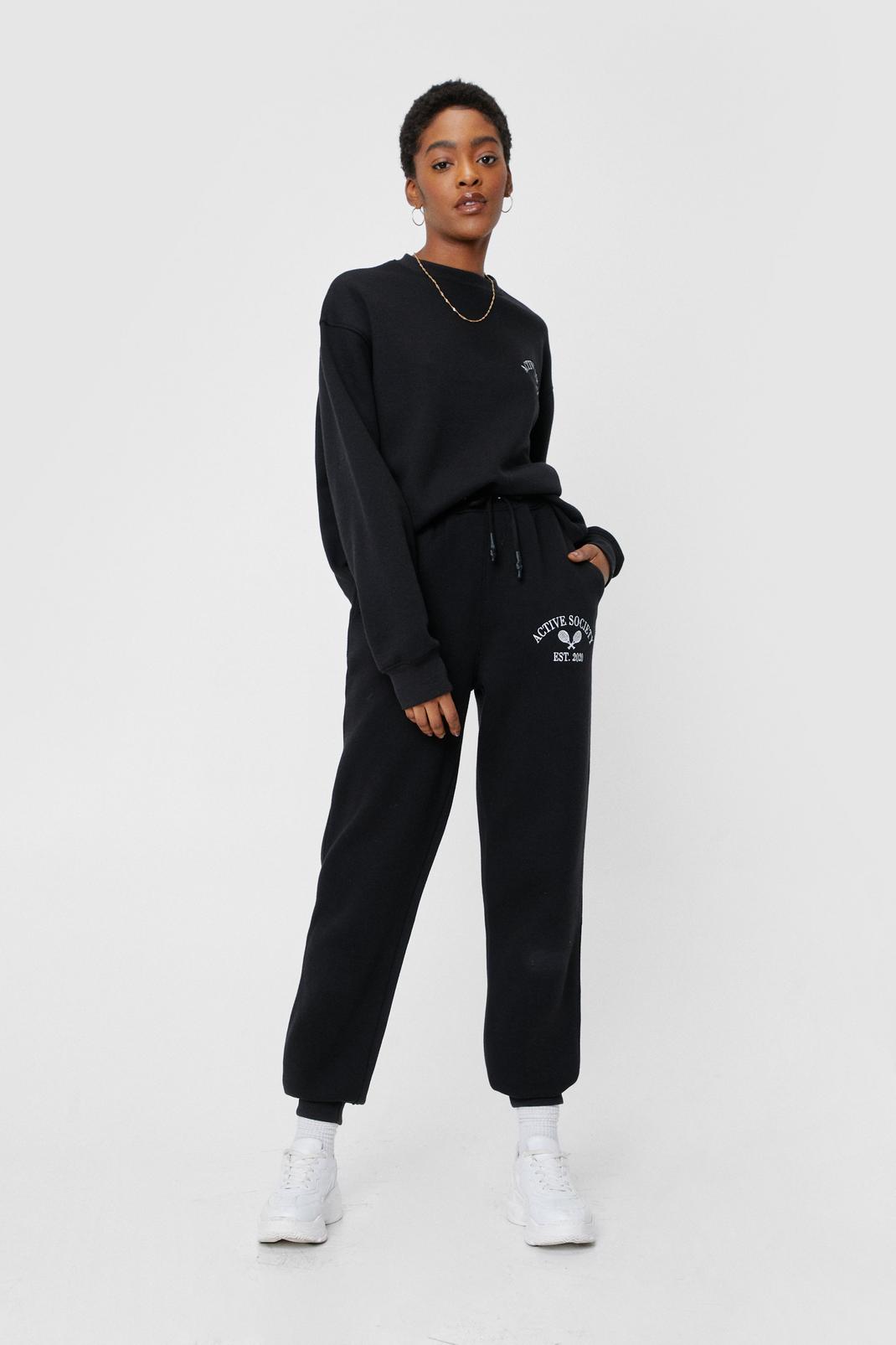Black Active Society Cuffed Graphic Tracksuit Pants image number 1