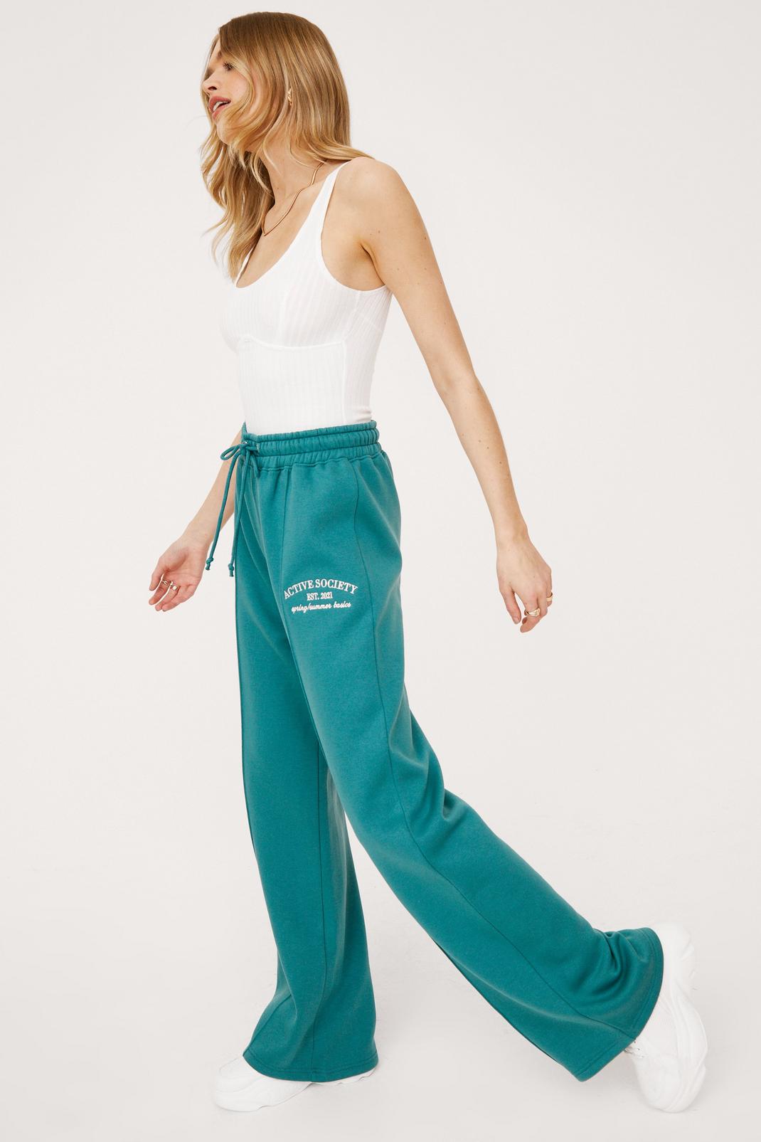 Teal Active Society Graphic Wide Leg Tracksuit Pants image number 1