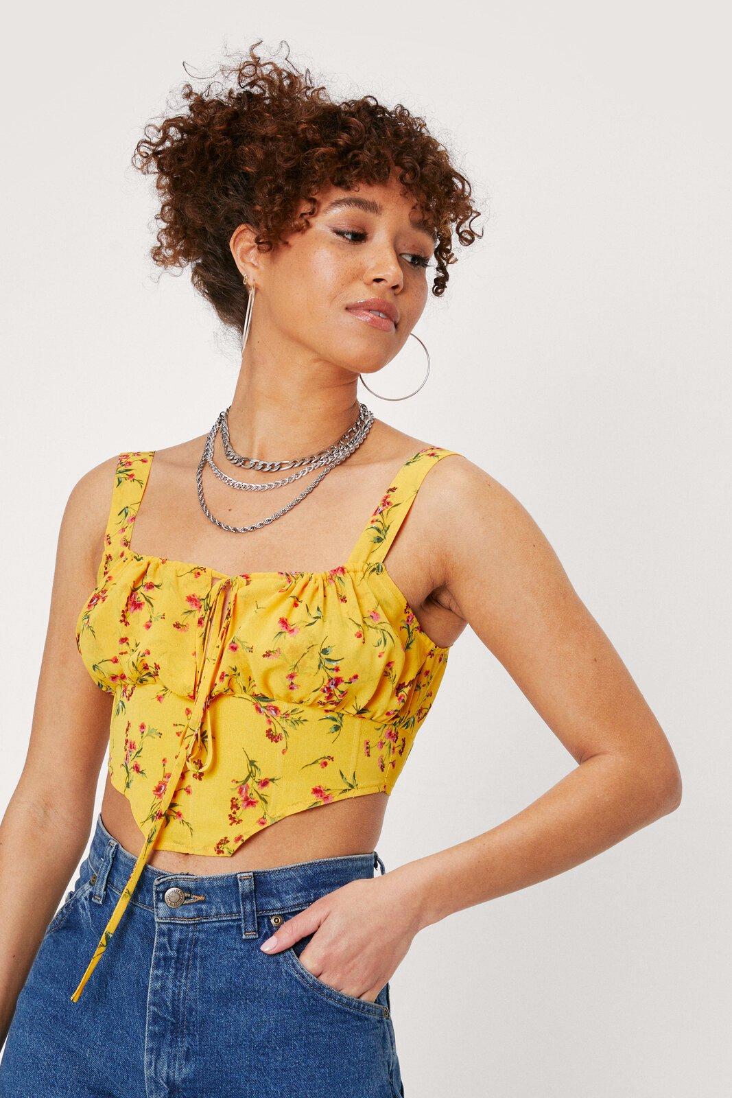 https://media.nastygal.com/i/nastygal/agg05012_yellow_xl_2/yellow-ruched-floral-woven-corset-top