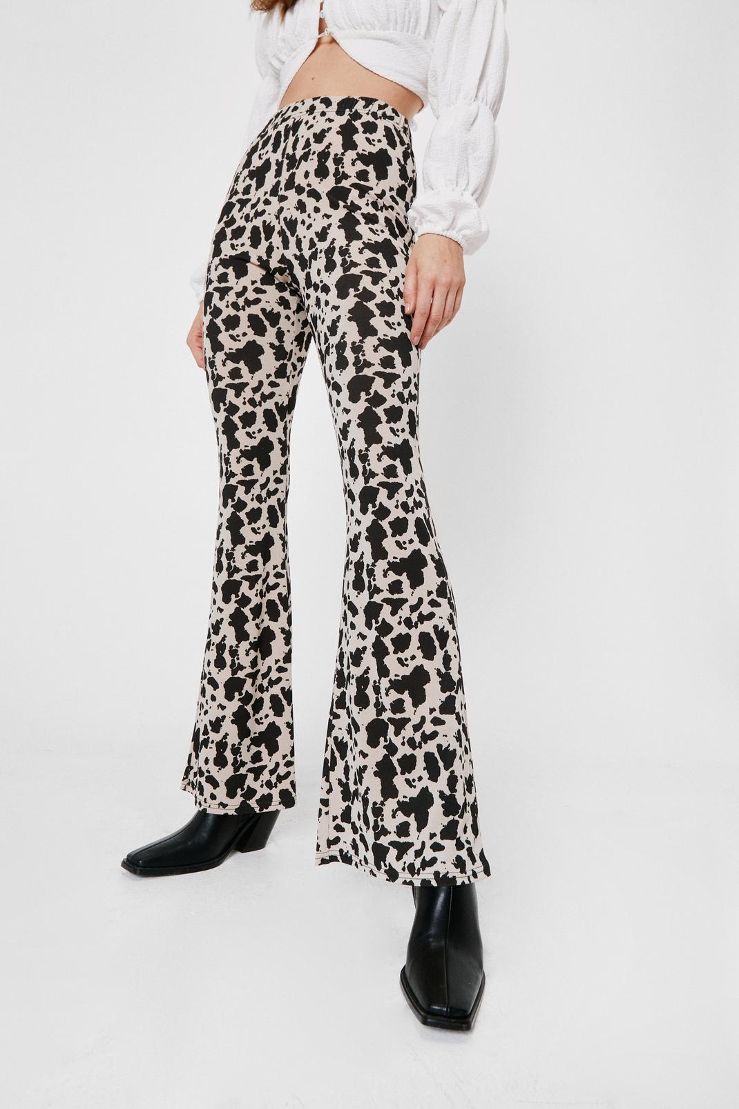 Cow Print Flare Pants | Nasty Gal