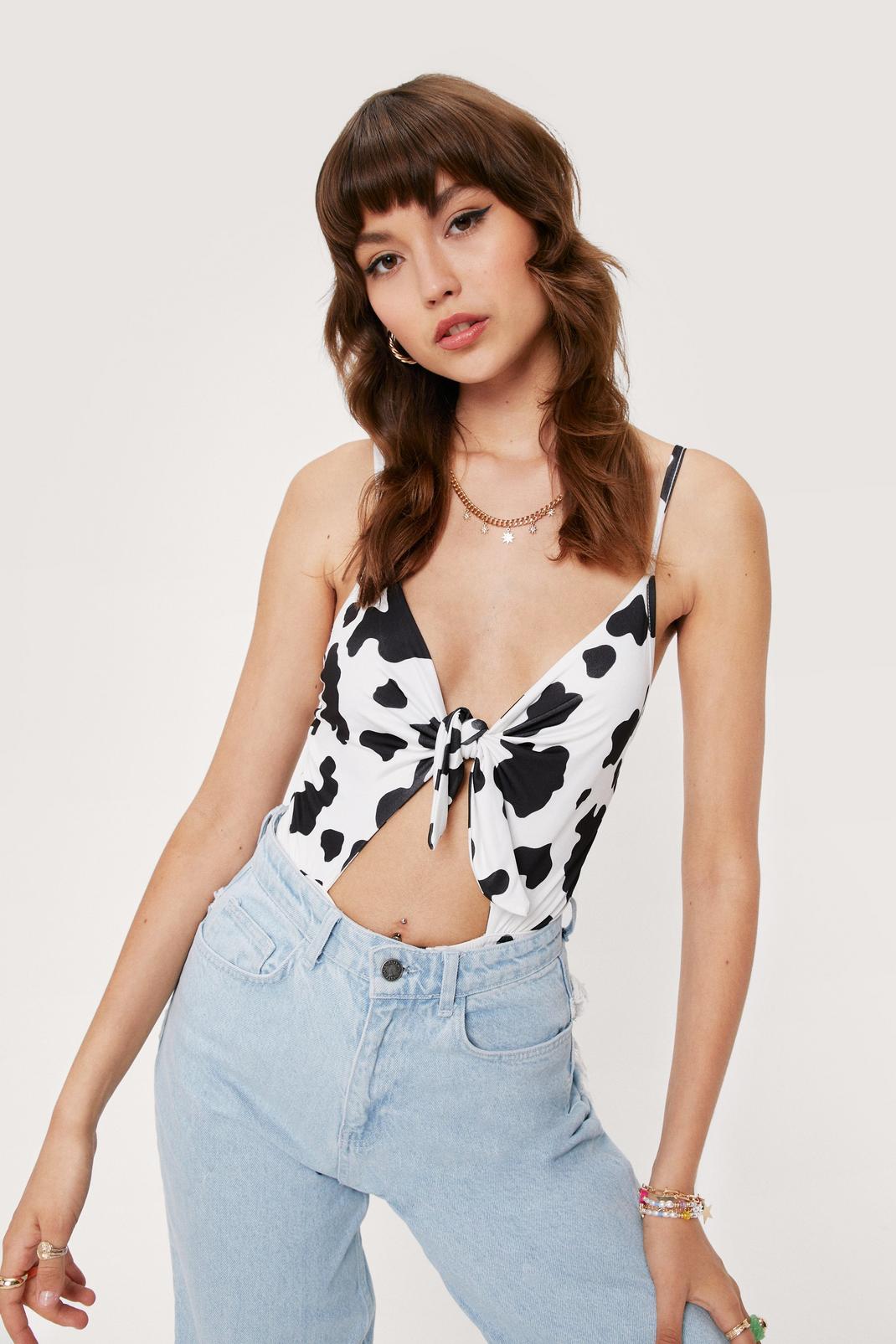 White Cow Print Cut Out Tie High Leg Bodysuit image number 1