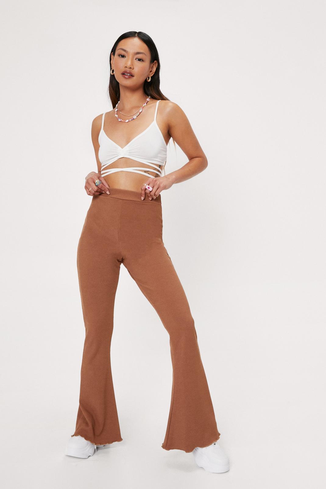 Chocolate Petite Ribbed Lettuce Hem Flared Trousers image number 1