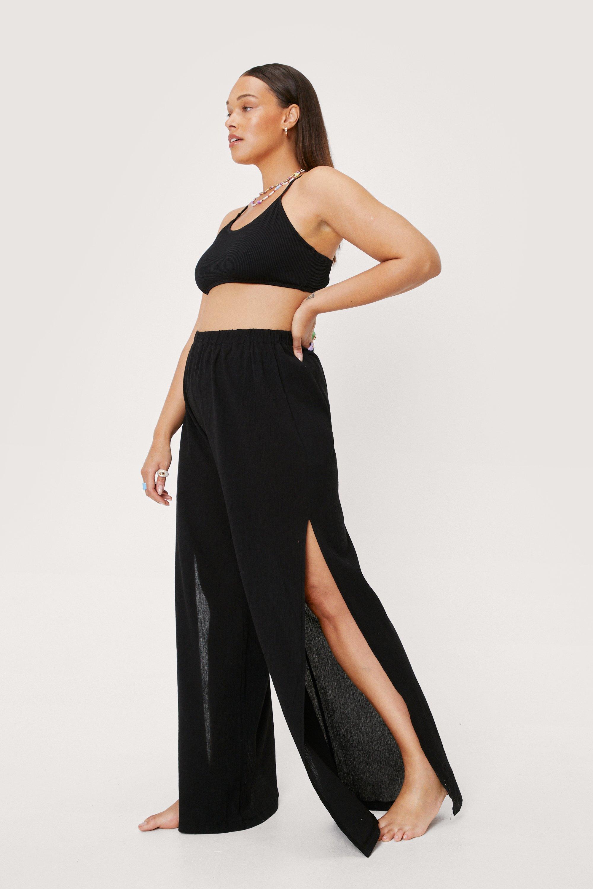 ASOS DESIGN petite crinkle wide leg palazzo beach pant in black