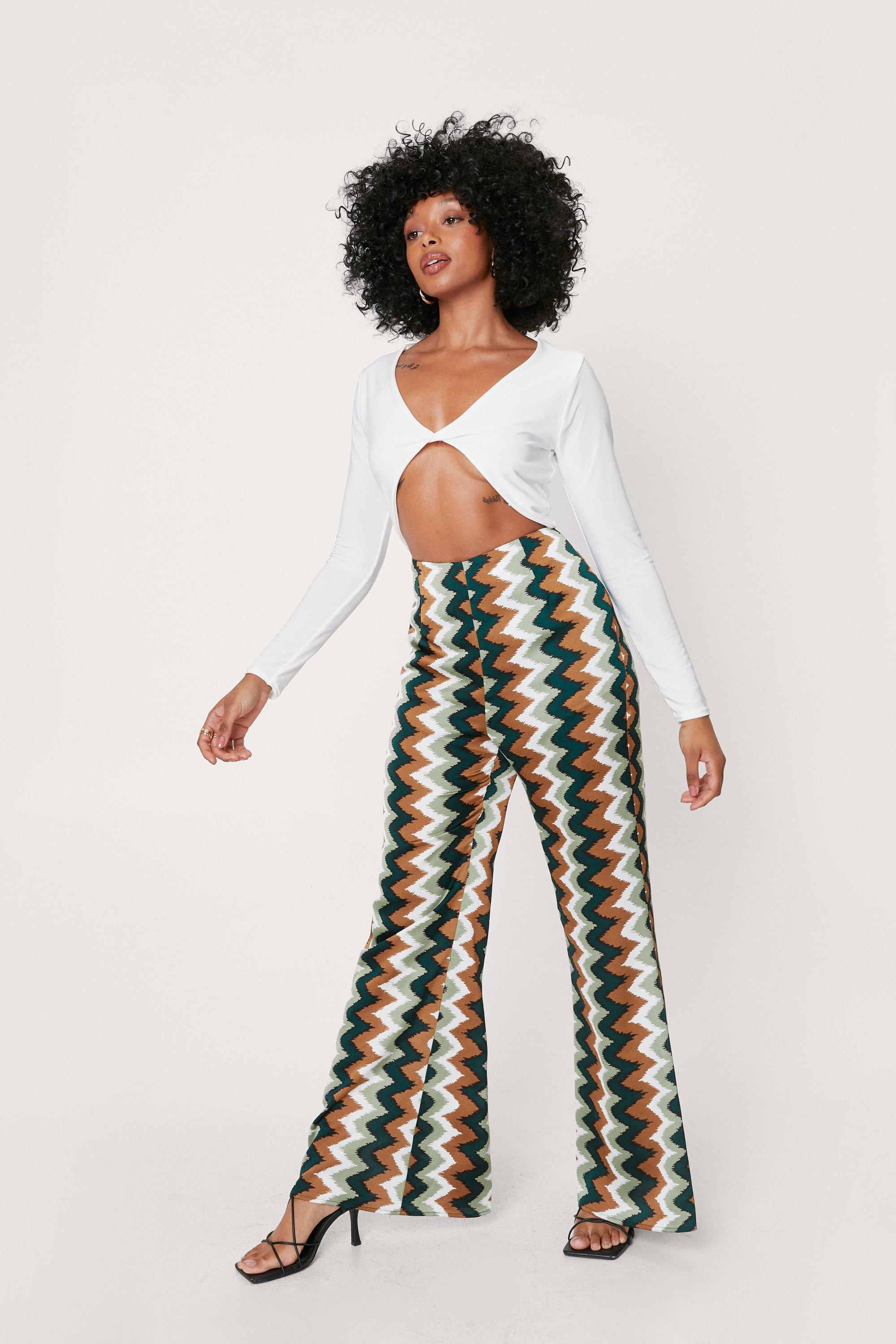 https://media.nastygal.com/i/nastygal/agg09888_green_xl_1/green-petite-zig-zag-print-flare-pants