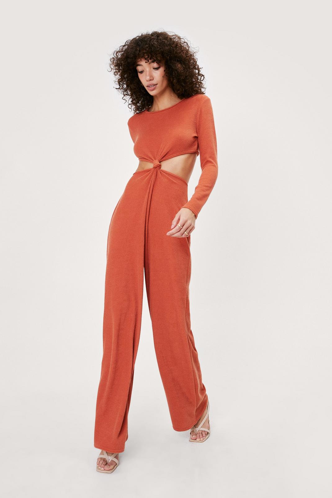 Rust Ribbed Knot Front Long Sleeve Jumpsuit image number 1