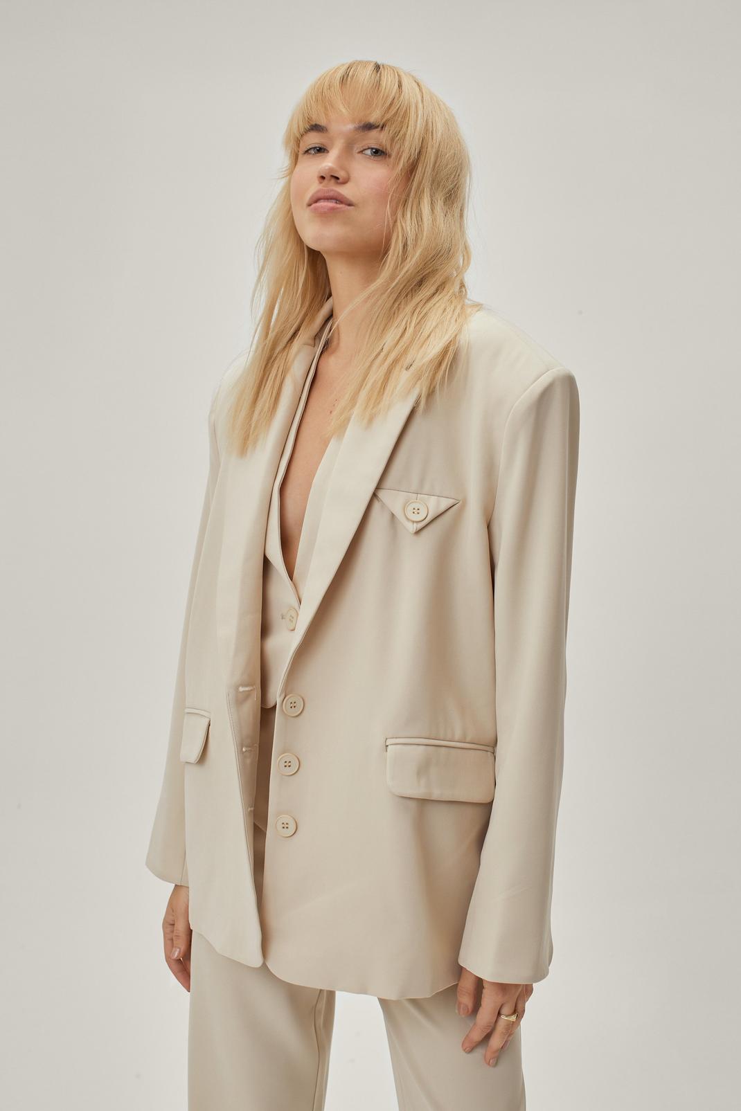 Premium - Blazer de costume sans manches à décolleté plongeant, Soft beige image number 1