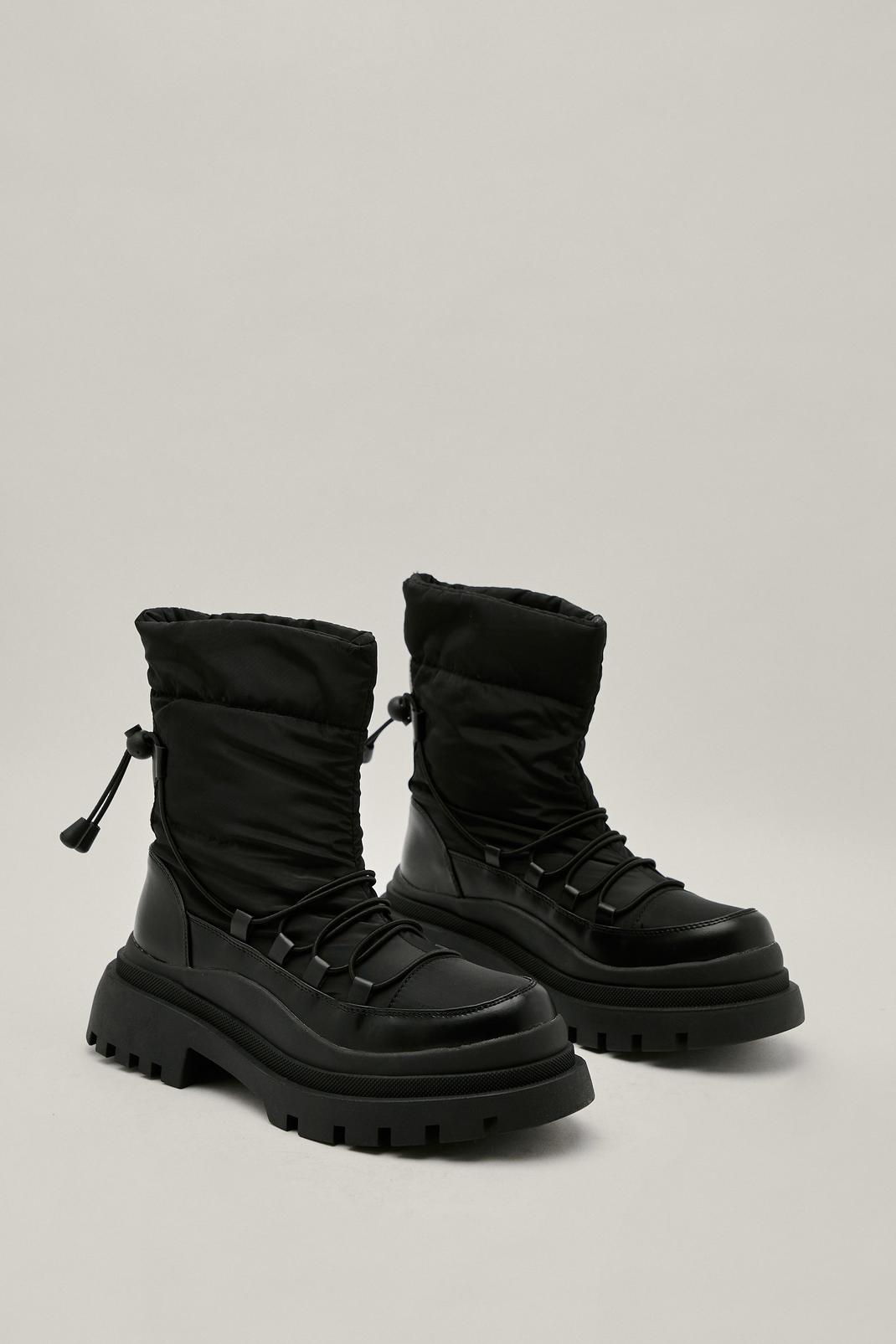 Black Padded Cleated Snow Boots image number 1