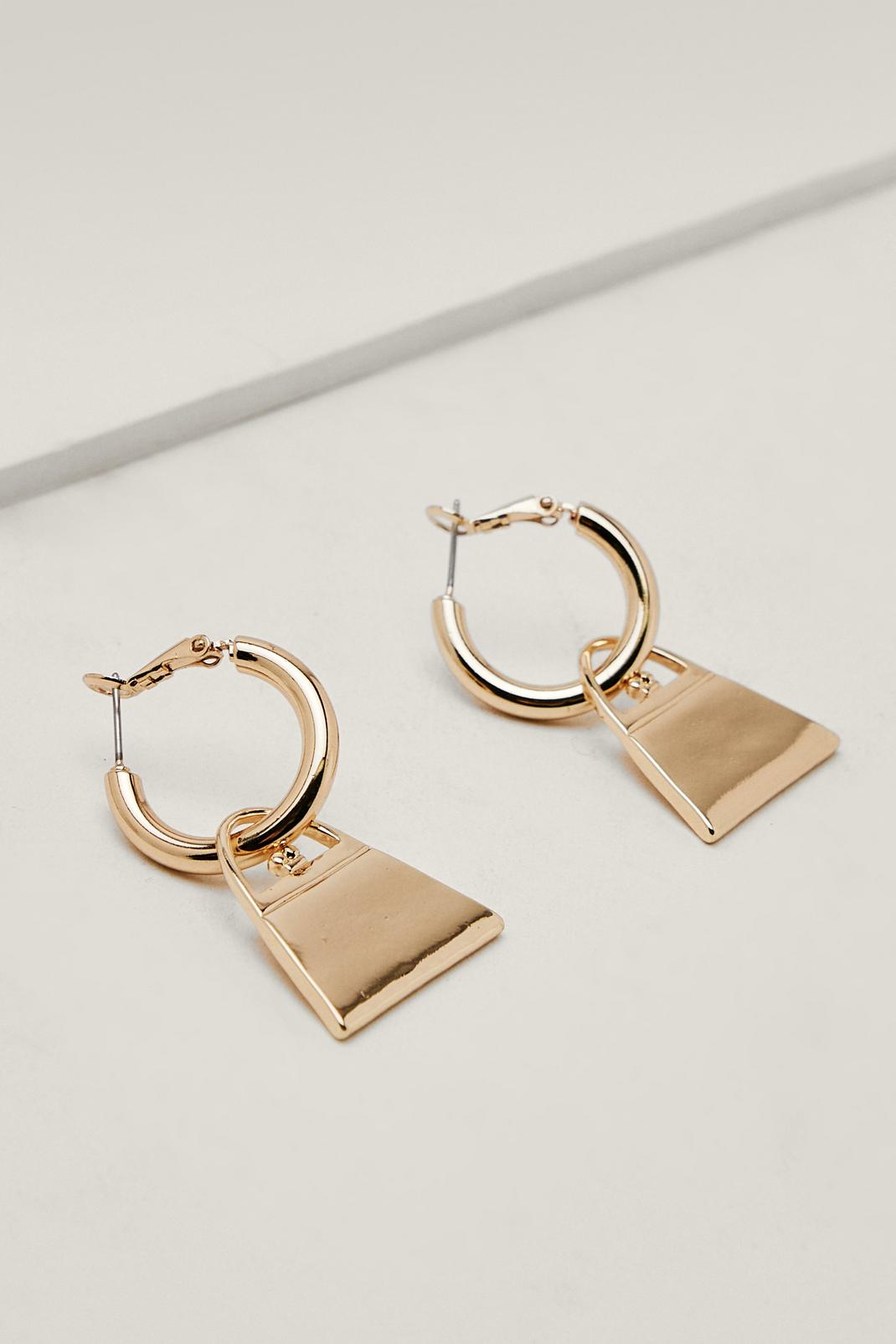 Boucles d'oreilles en forme d'anneau avec mini-sac, Gold image number 1