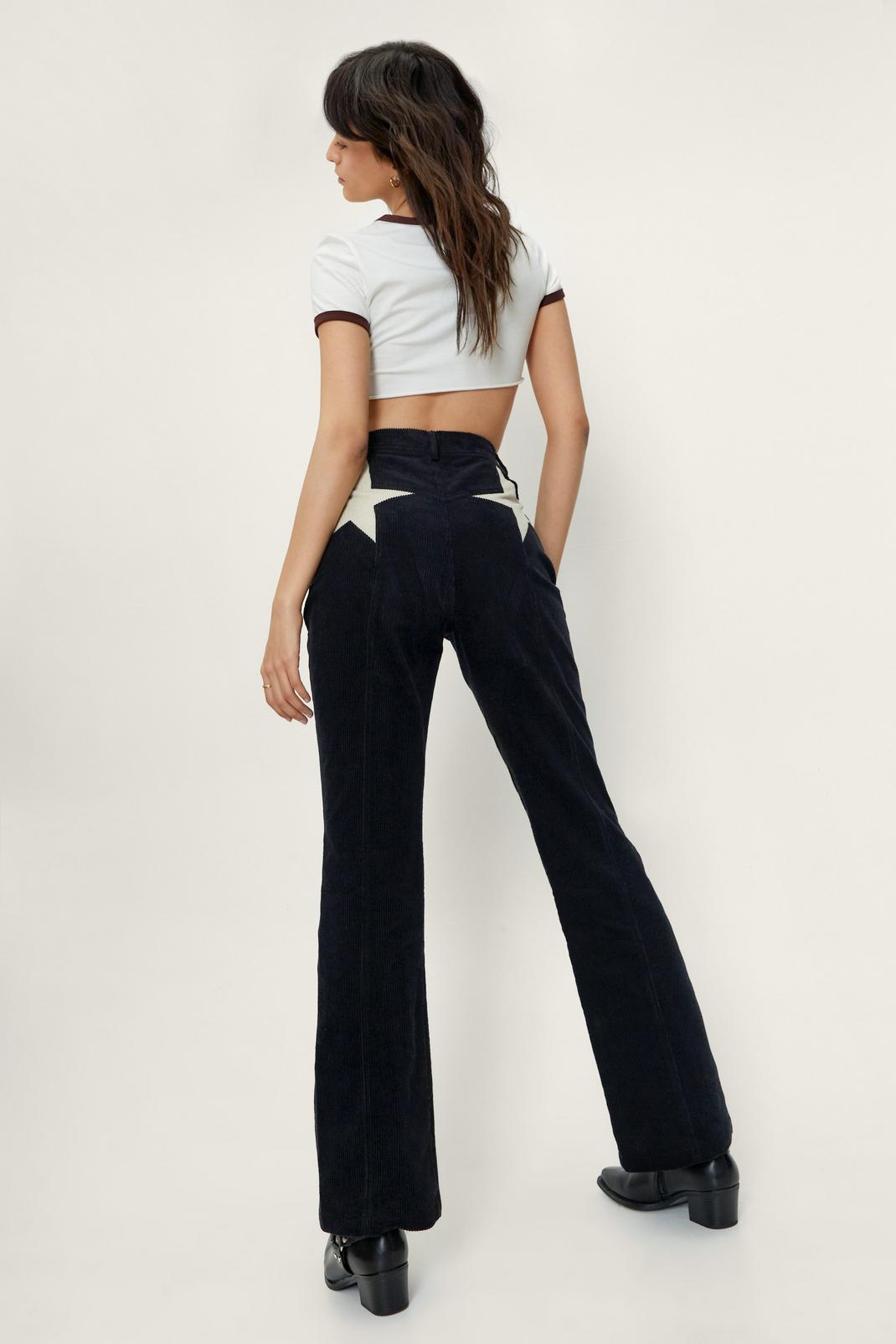 Black Corduroy High Waisted Flared Star Bum Trousers image number 1