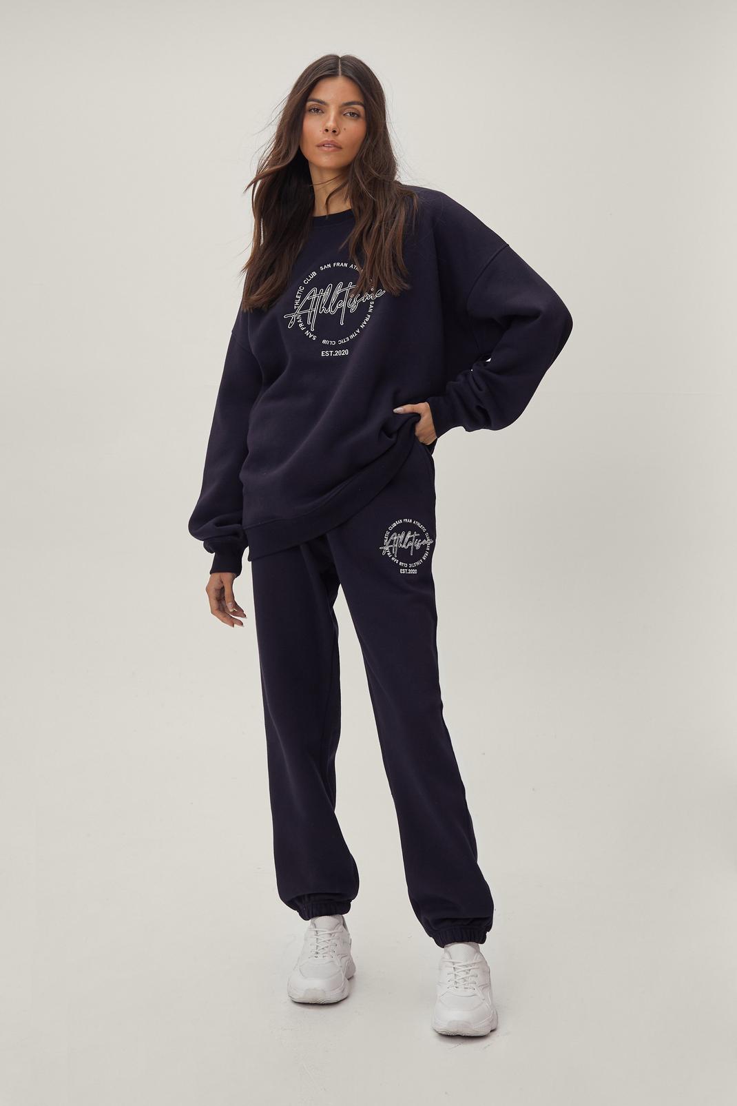 Navy Embroidered Circle Athletisme Relaxed Tracksuit Pants image number 1