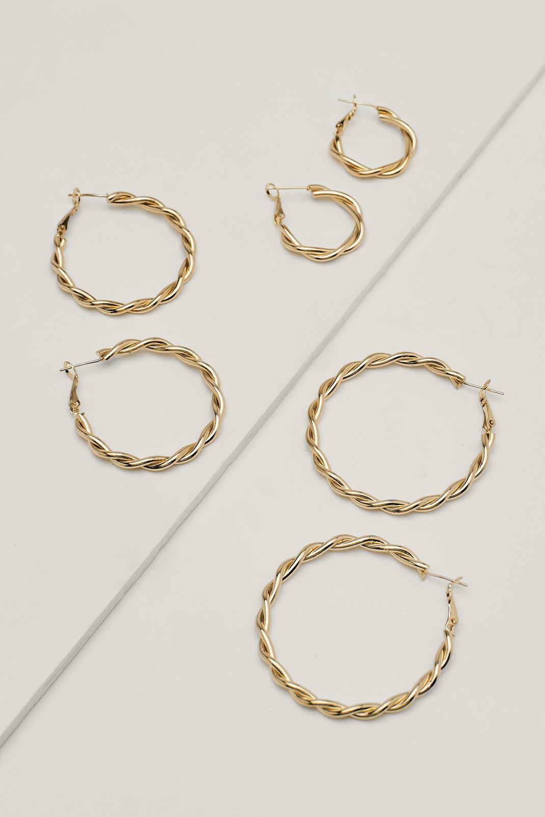 Gold Twisted Metal Hoop Earring Set image number 1