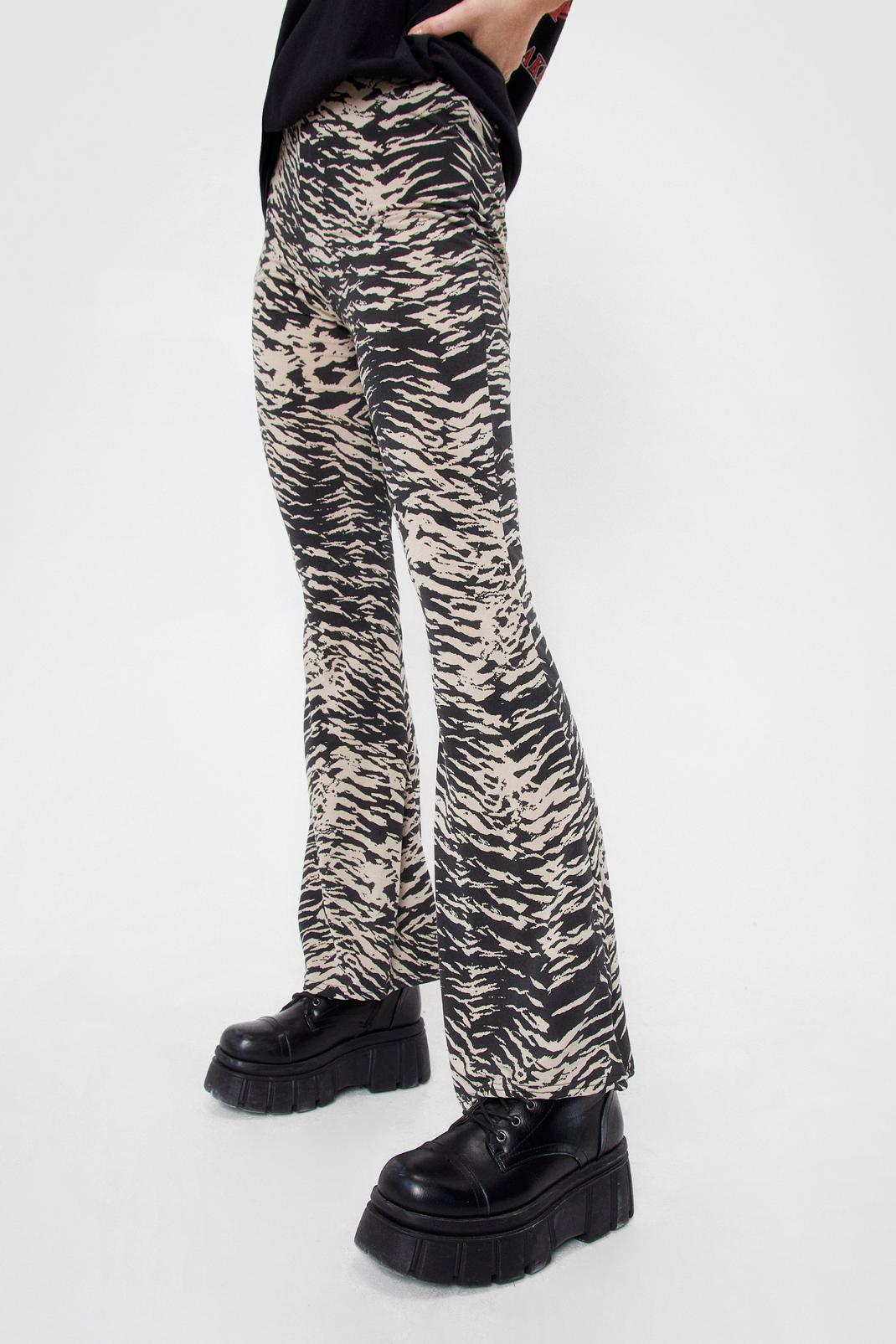 pink zebra flare pants