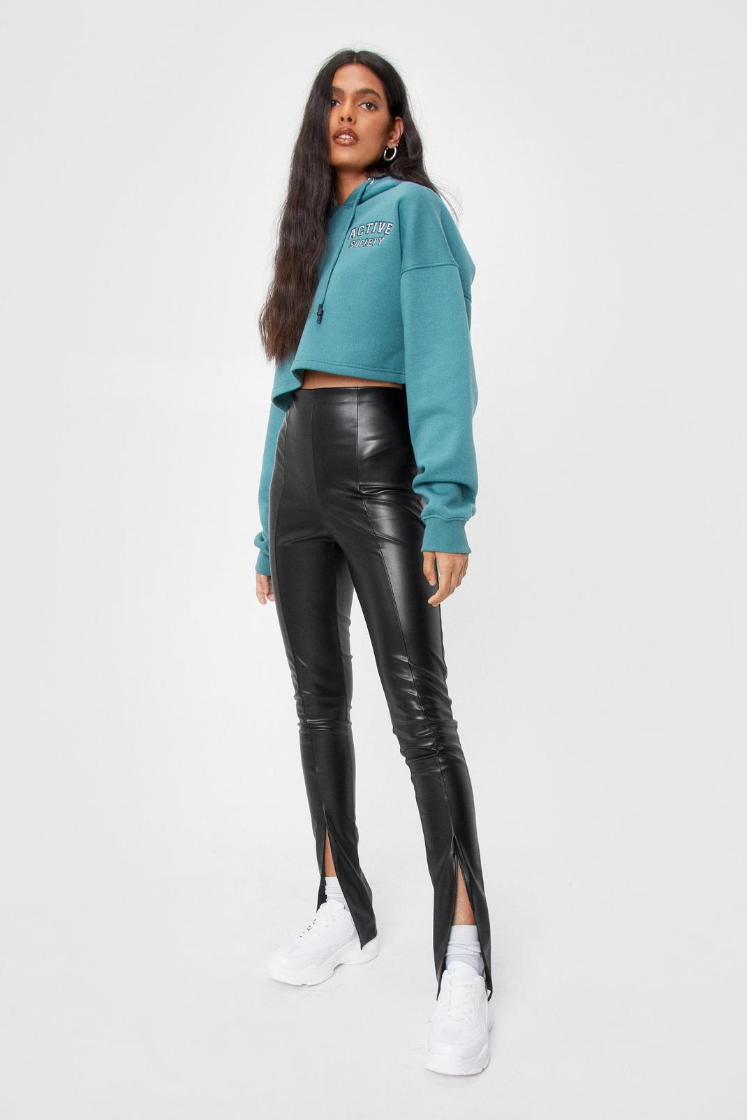 https://media.nastygal.com/i/nastygal/agg41248_black_xl/female-black-leather-look-split-front-leggings/?w=1070&qlt=default&fmt.jp2.qlt=70&fmt=auto&sm=fit