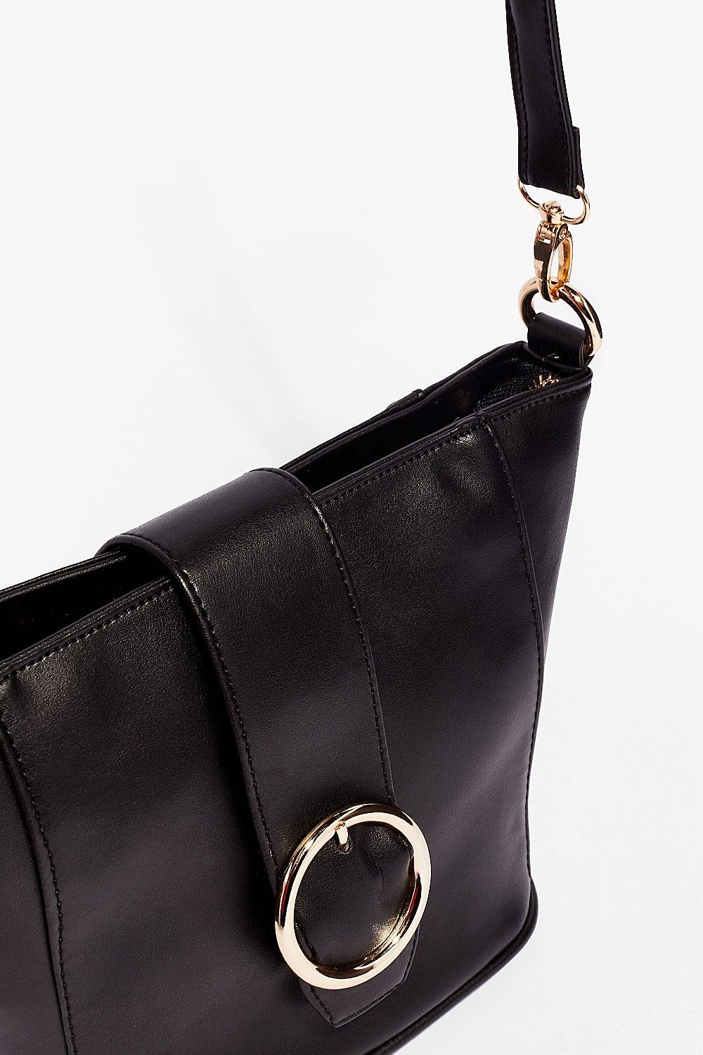 Circular buckle crossbody on sale bag