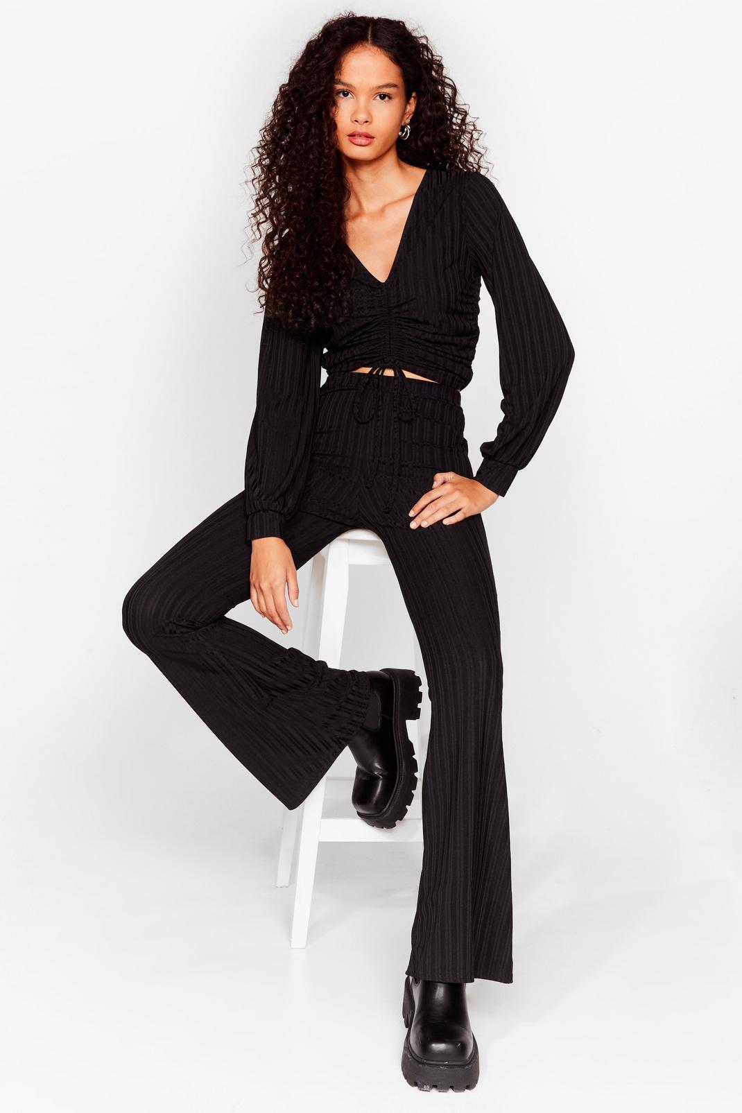 Black Flares the Party Ribbed High-Waisted Pants image number 1