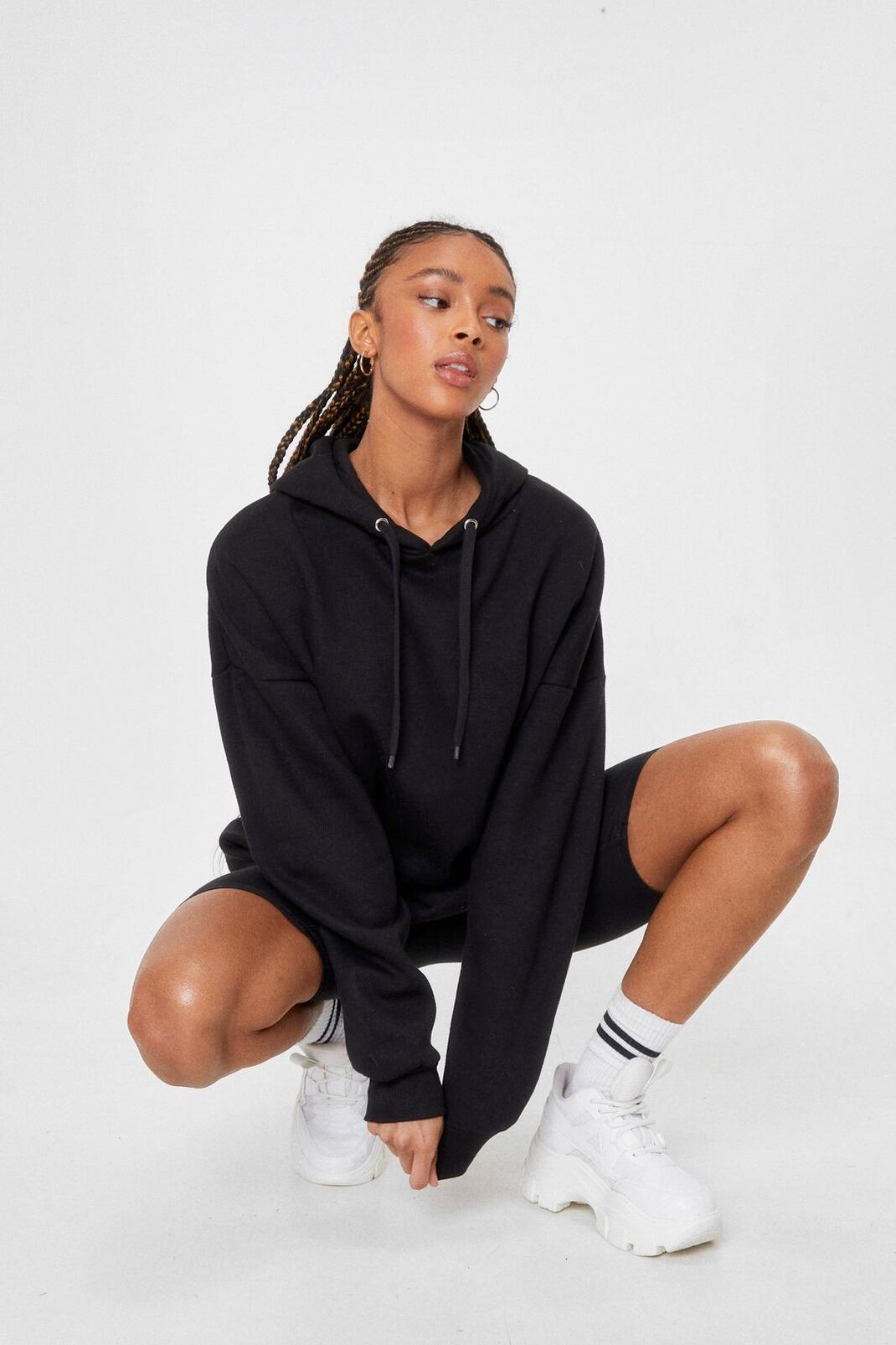 Black A Big Believer Oversized Pullover Hoodie image number 1