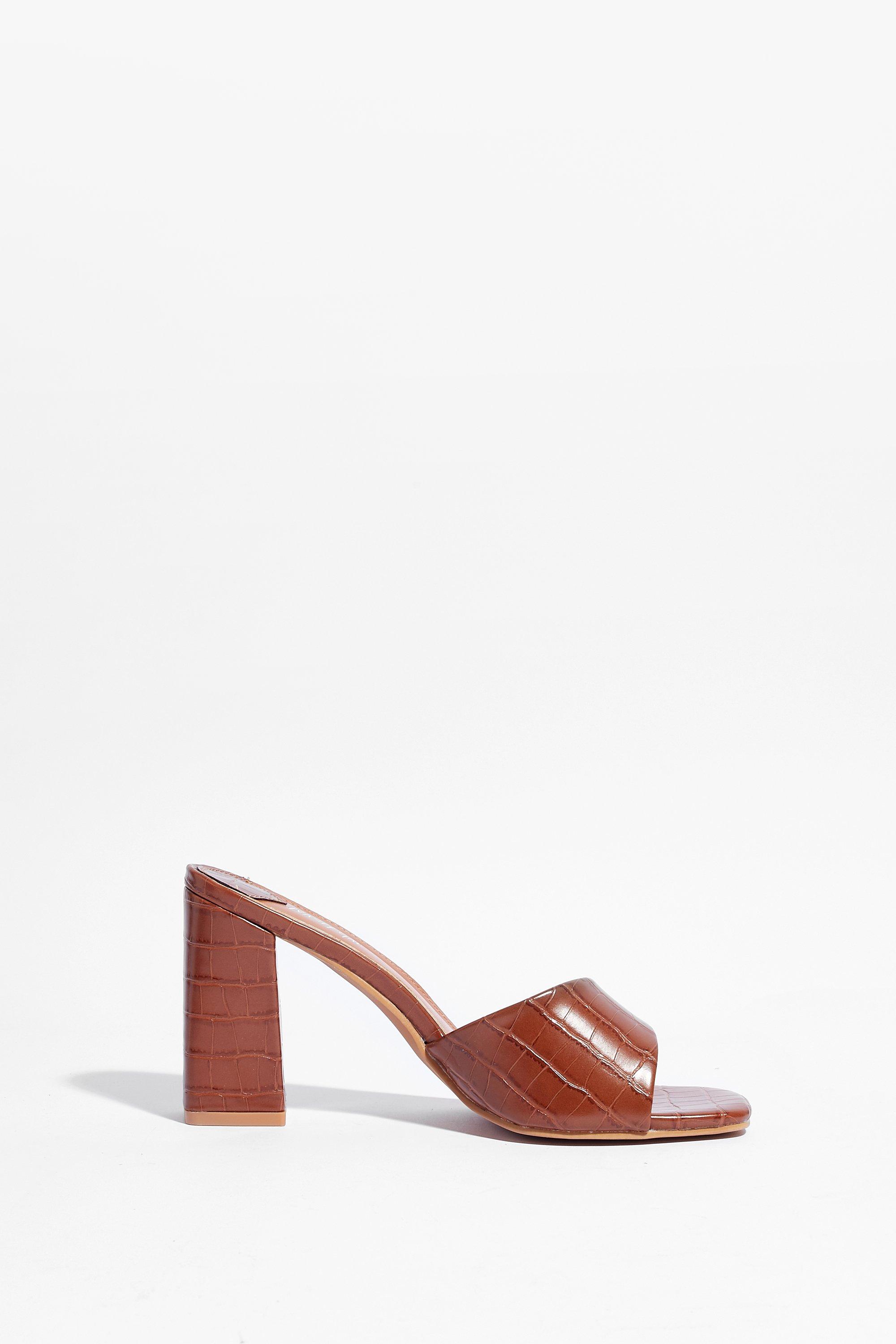 heeled mules with asymmetrical straps