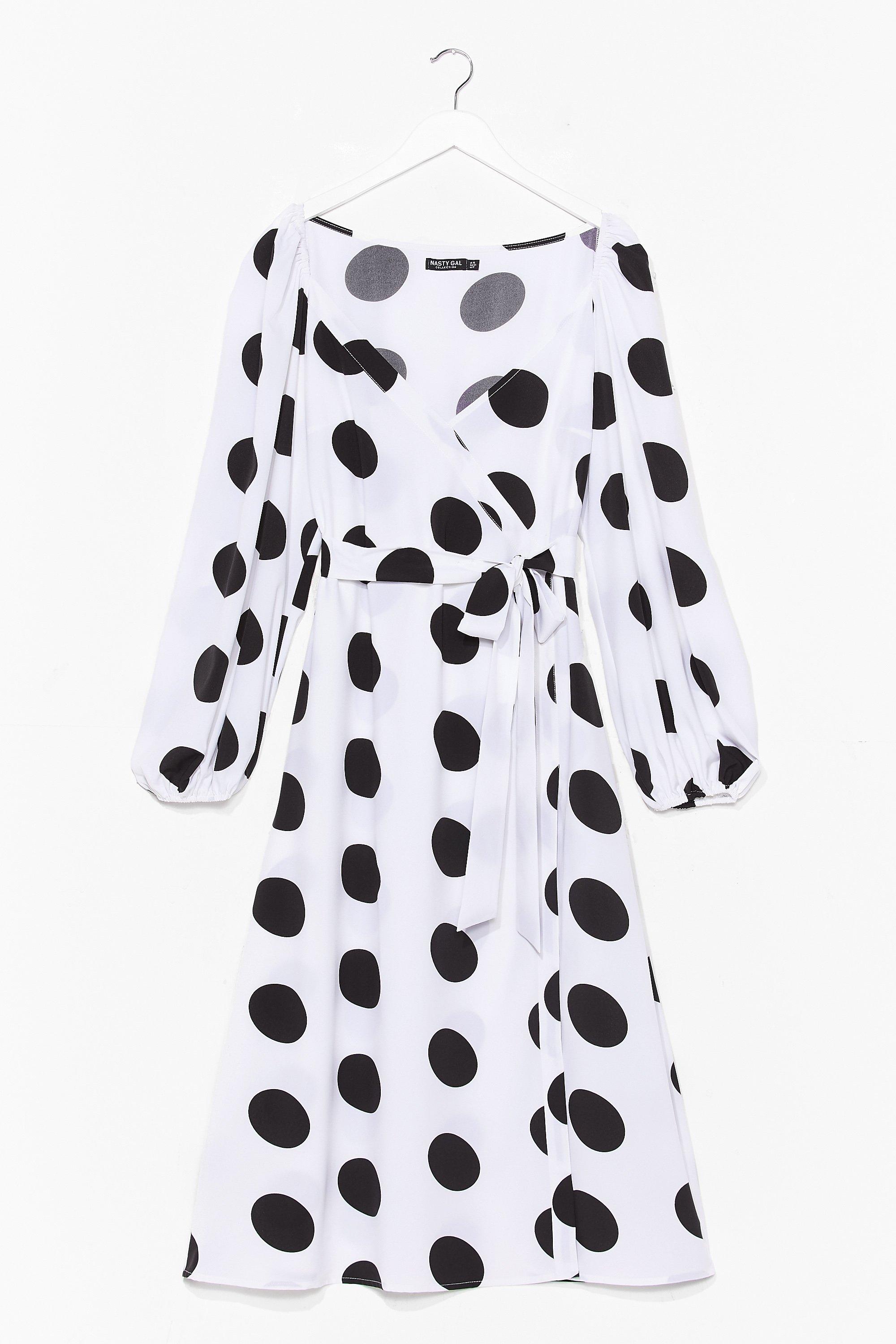 white midi dress with black polka dots