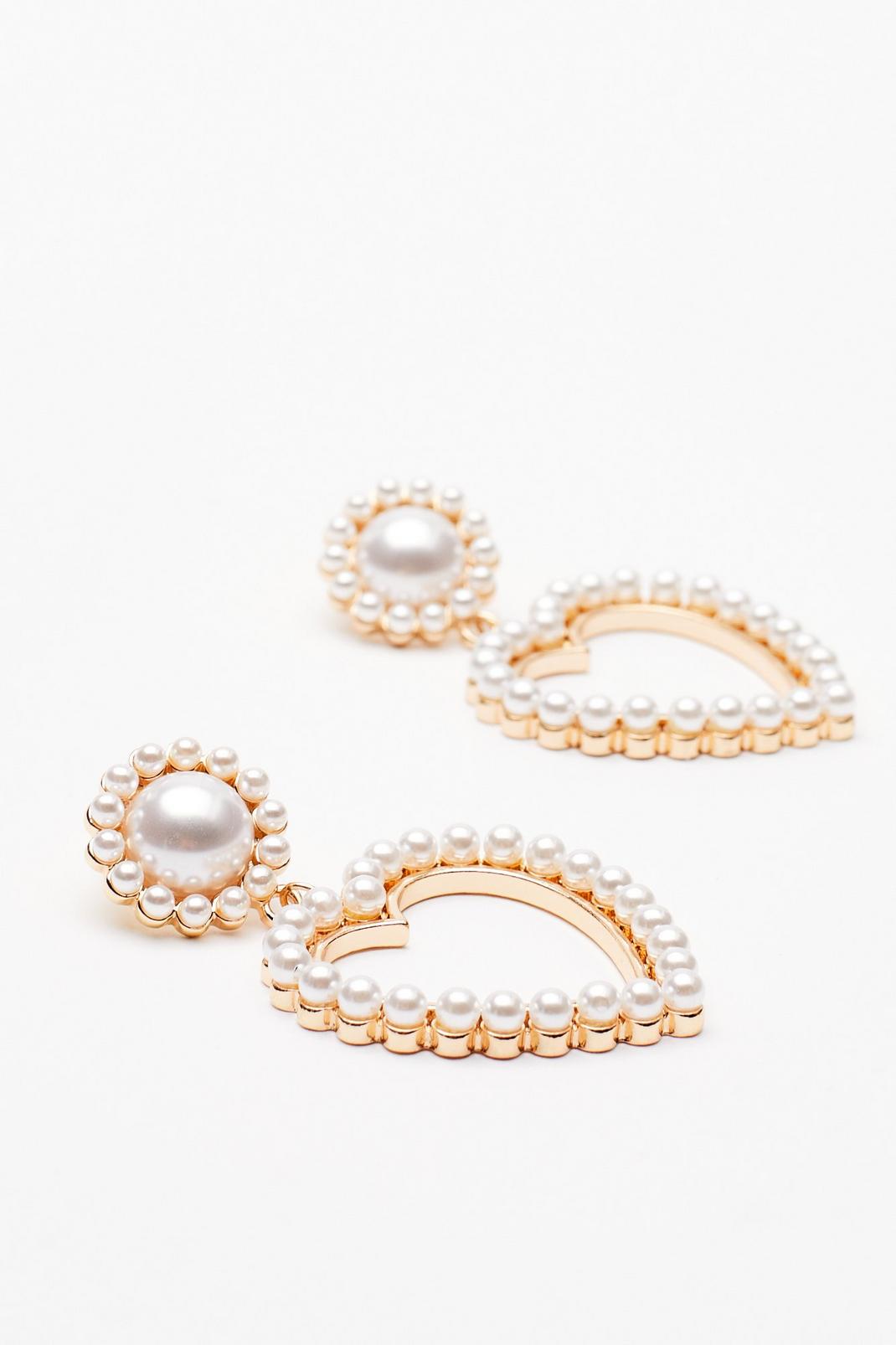 Boucles d'oreilles pendantes cœur à perles image number 1