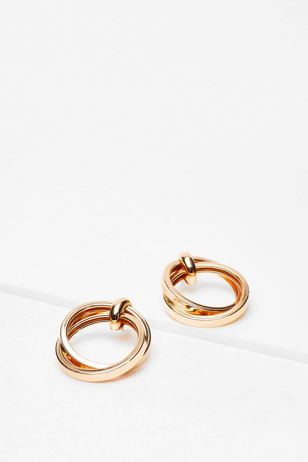 Gold Jumping Through Hoops Drop Earrings image number 1