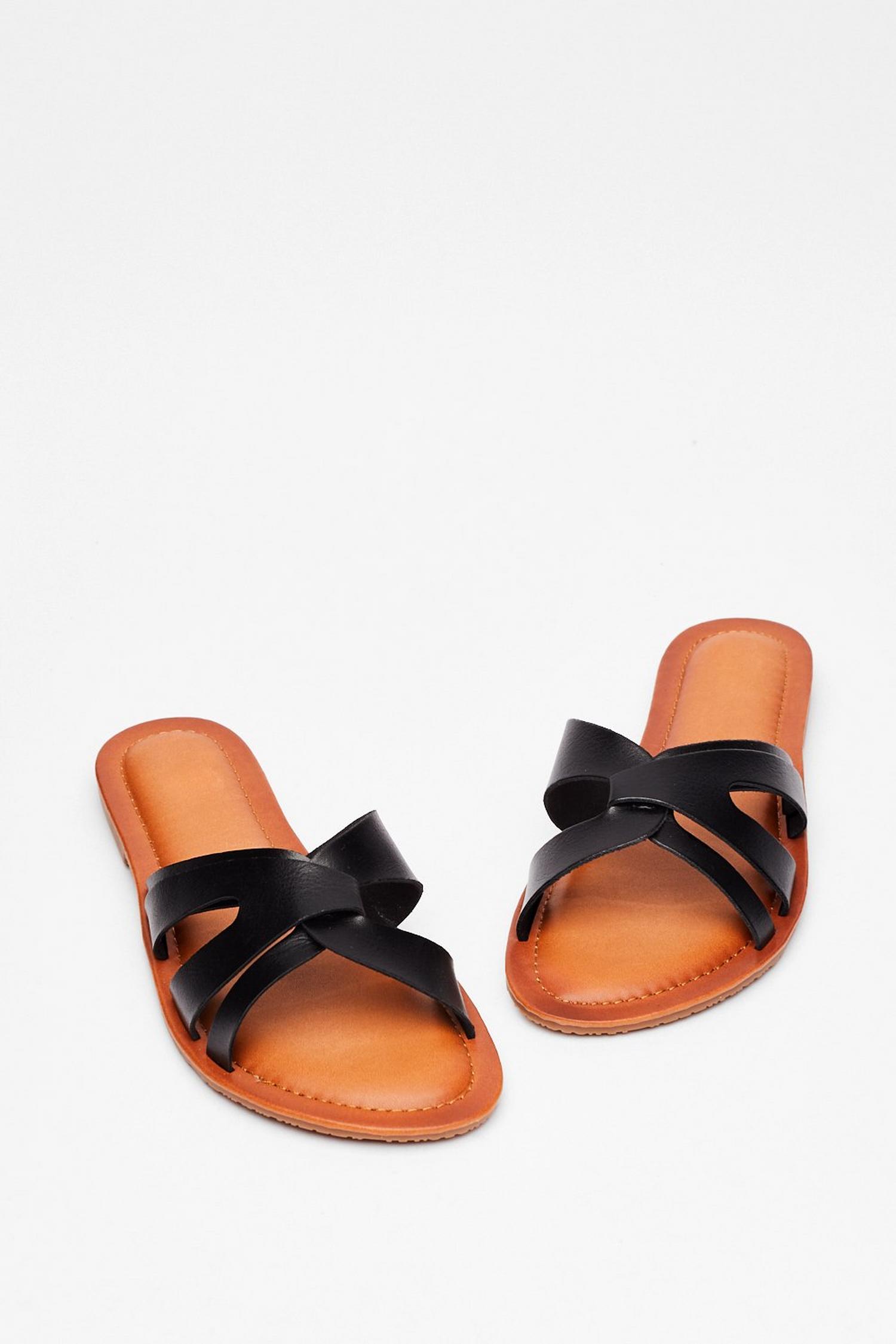 black flat crossover sandals