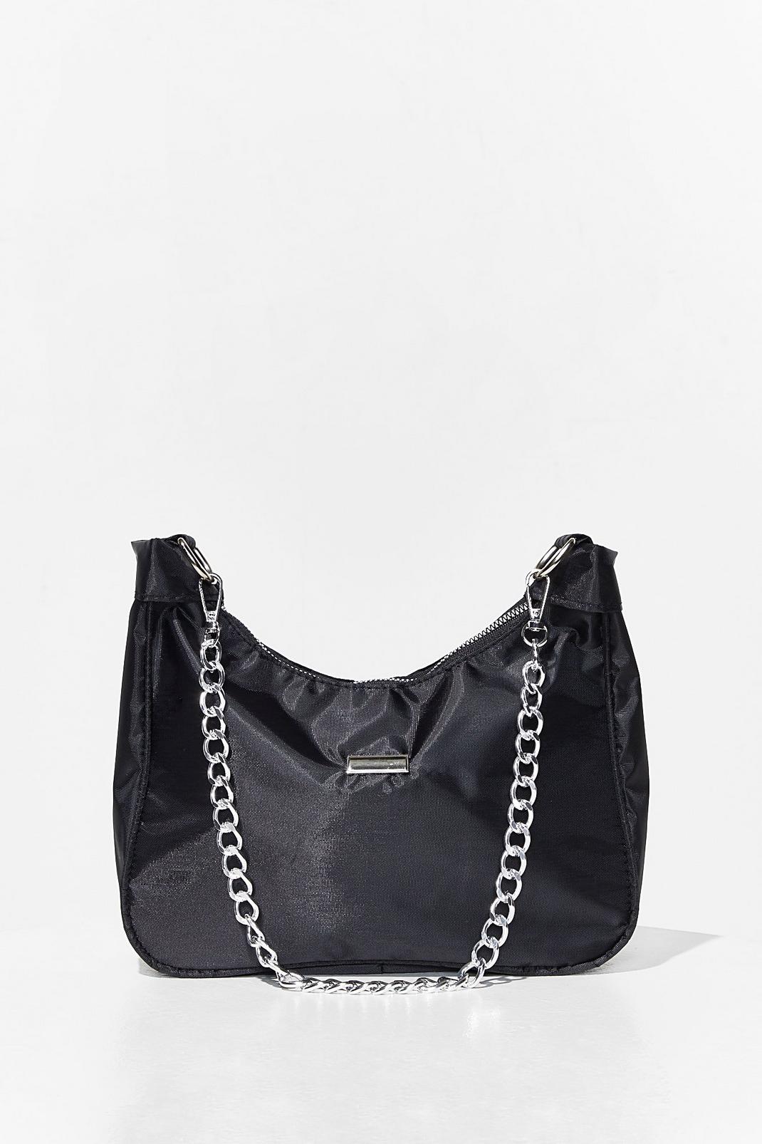 small black shoulder bag with chain strap