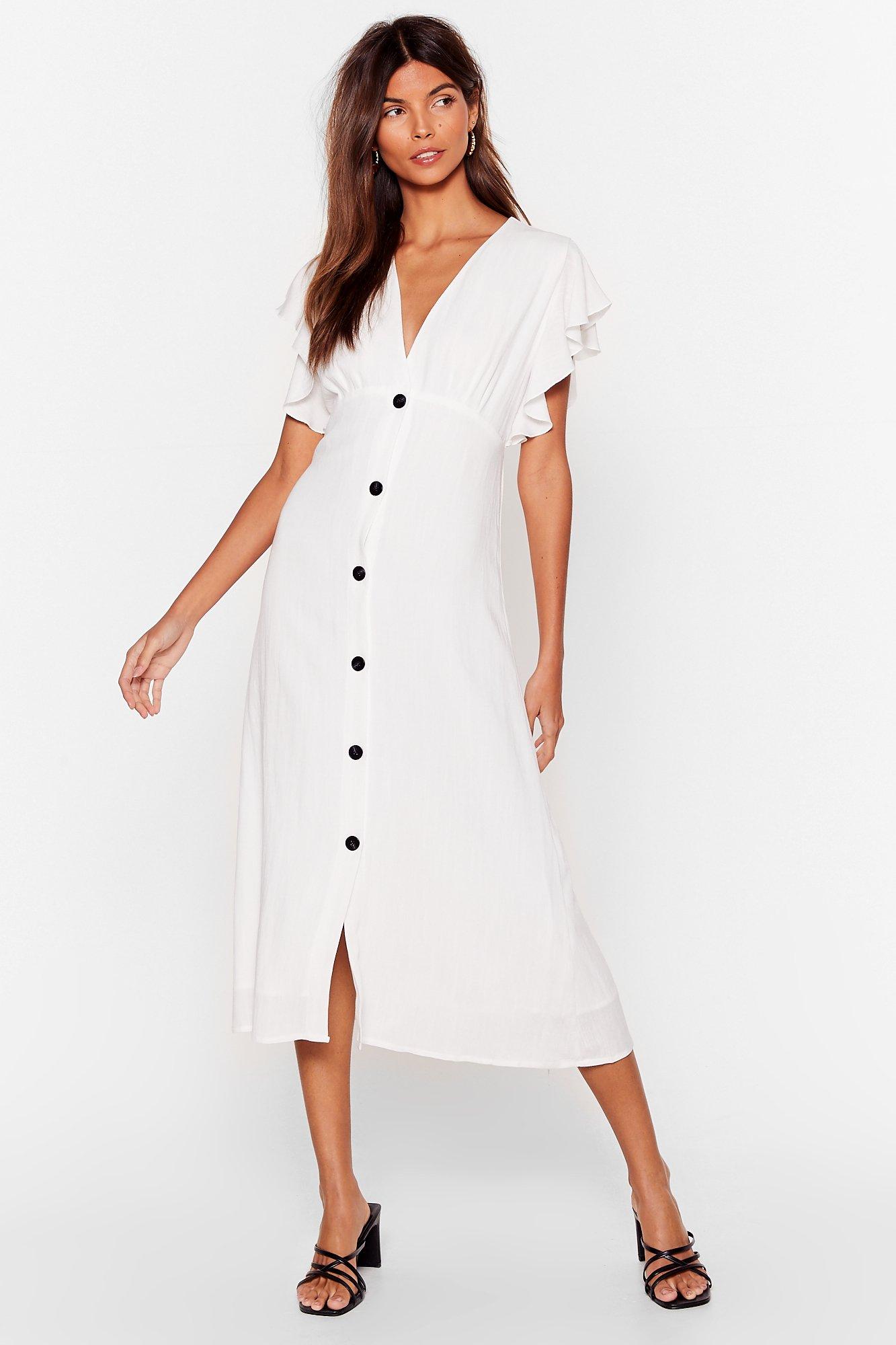 white dress with buttons on front