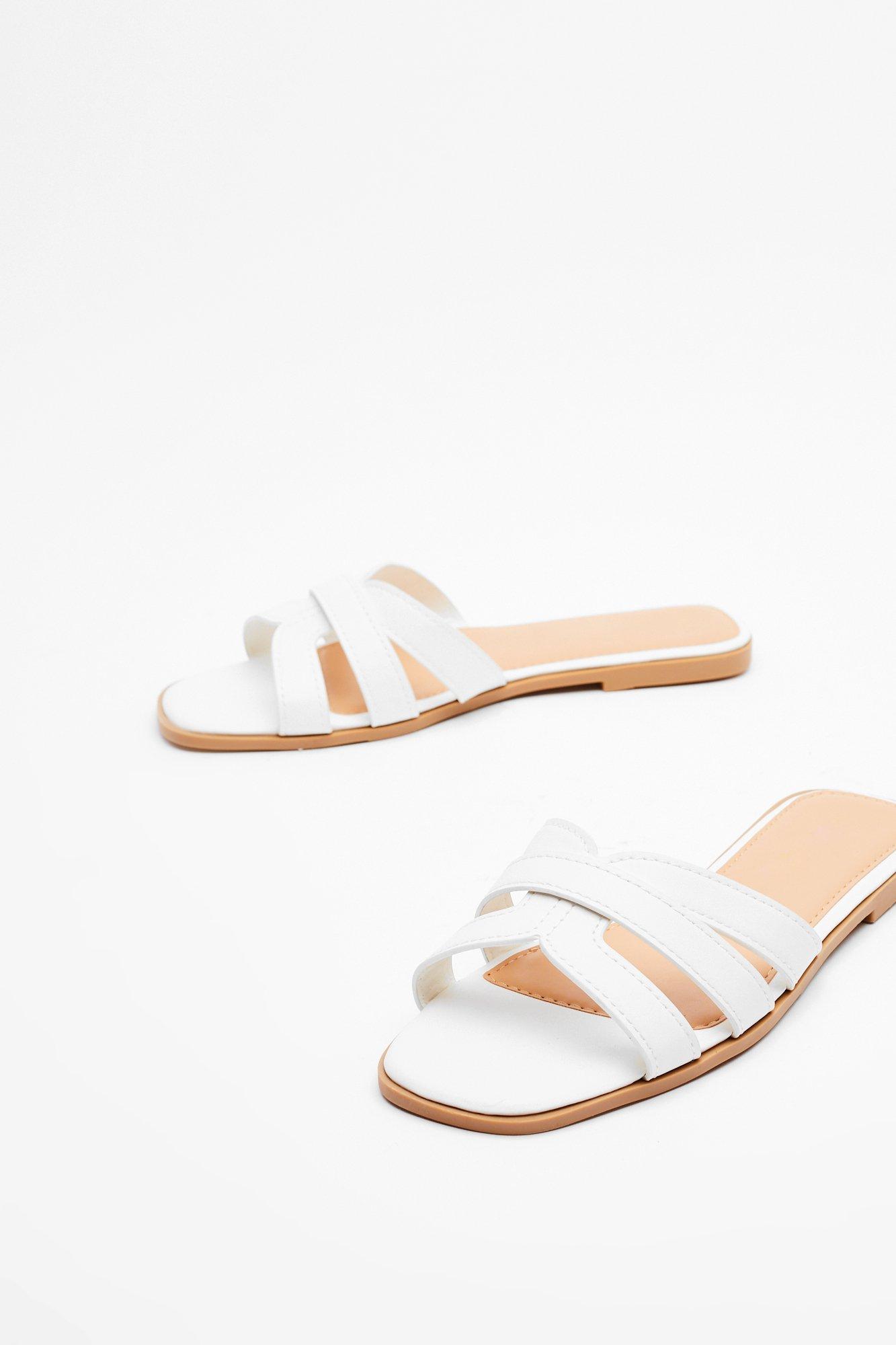 white slip on sandals flat