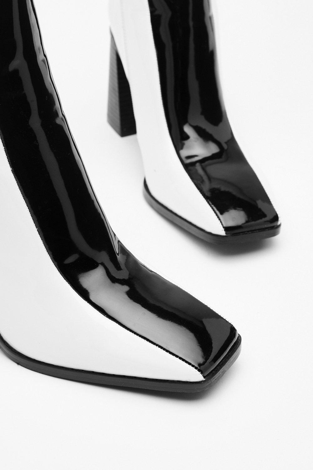 Nasty gal black 2025 and white boots