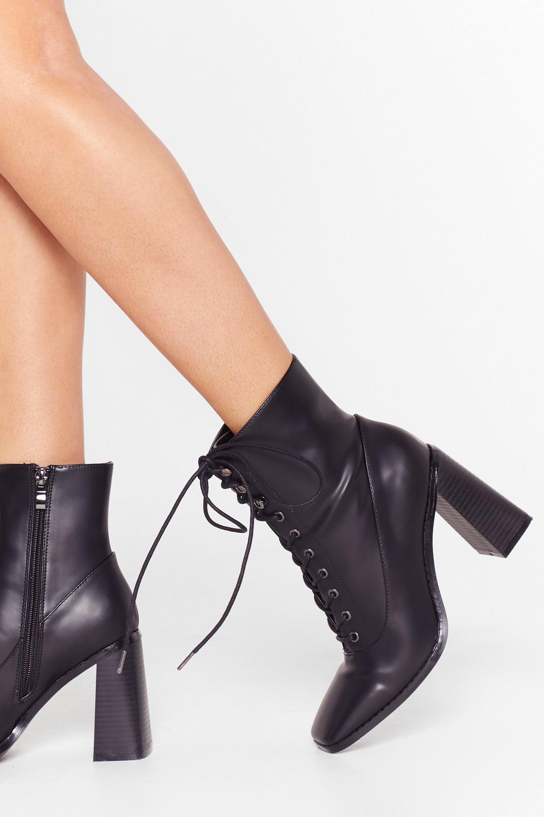 What's Lace-Up Faux Leather Flare Boots | Nasty Gal