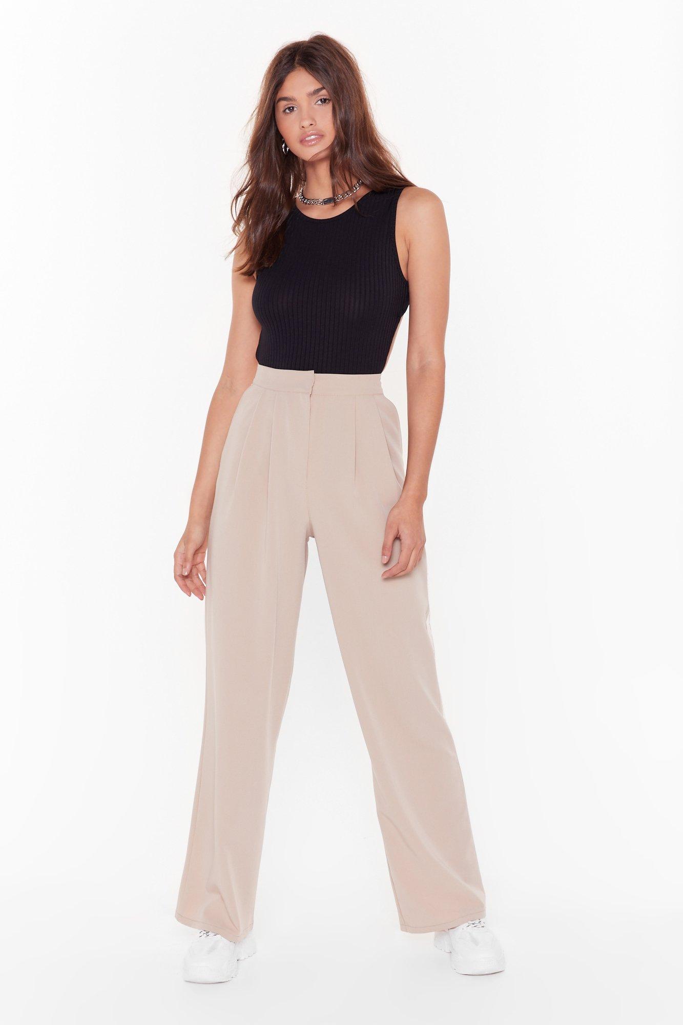 beige high waisted trousers