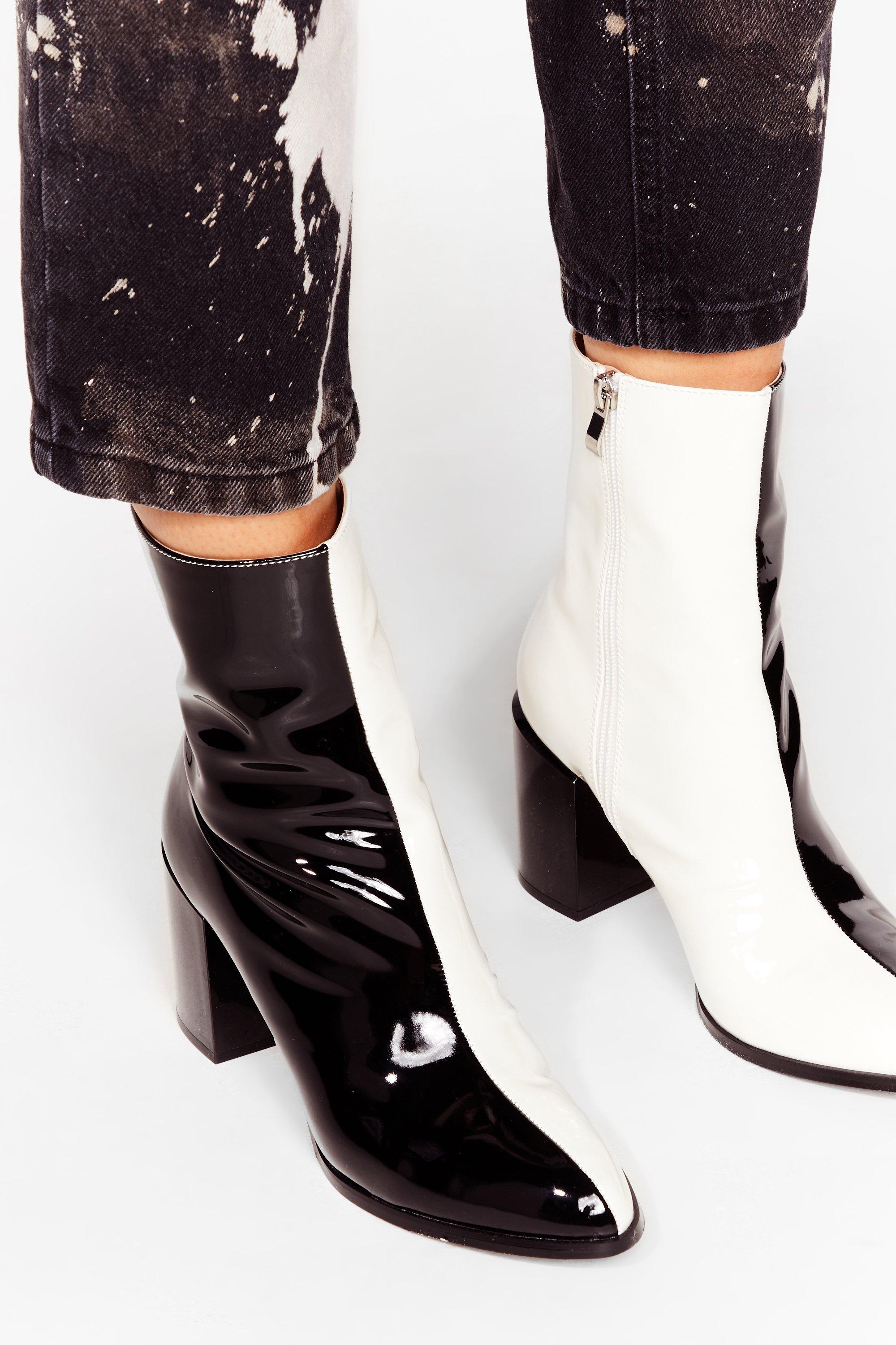 Nasty gal black 2025 and white boots